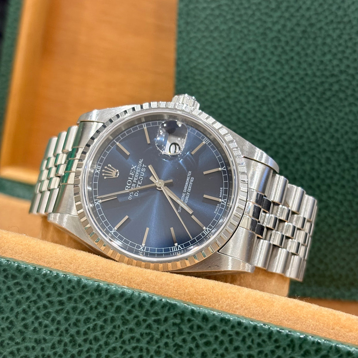 Rolex Datejust 36mm ref 16220 stainless steel blue dial with engine turned bezel on Jubilee bracelet at Adonia Jewellers in Yorkville, Toronto