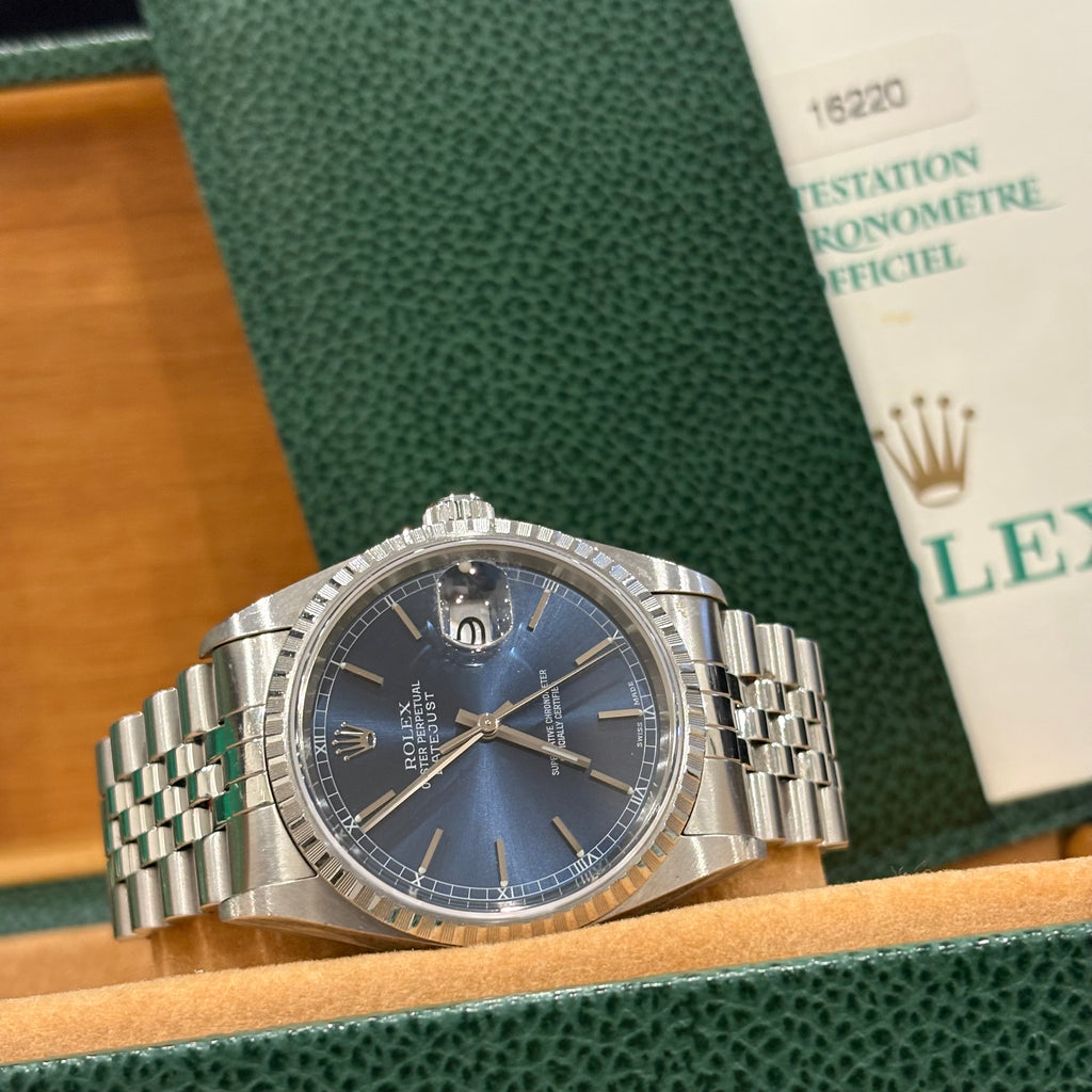Rolex Datejust 36 16220 blue dial with its original Rolex chronometer certificate showing the reference number