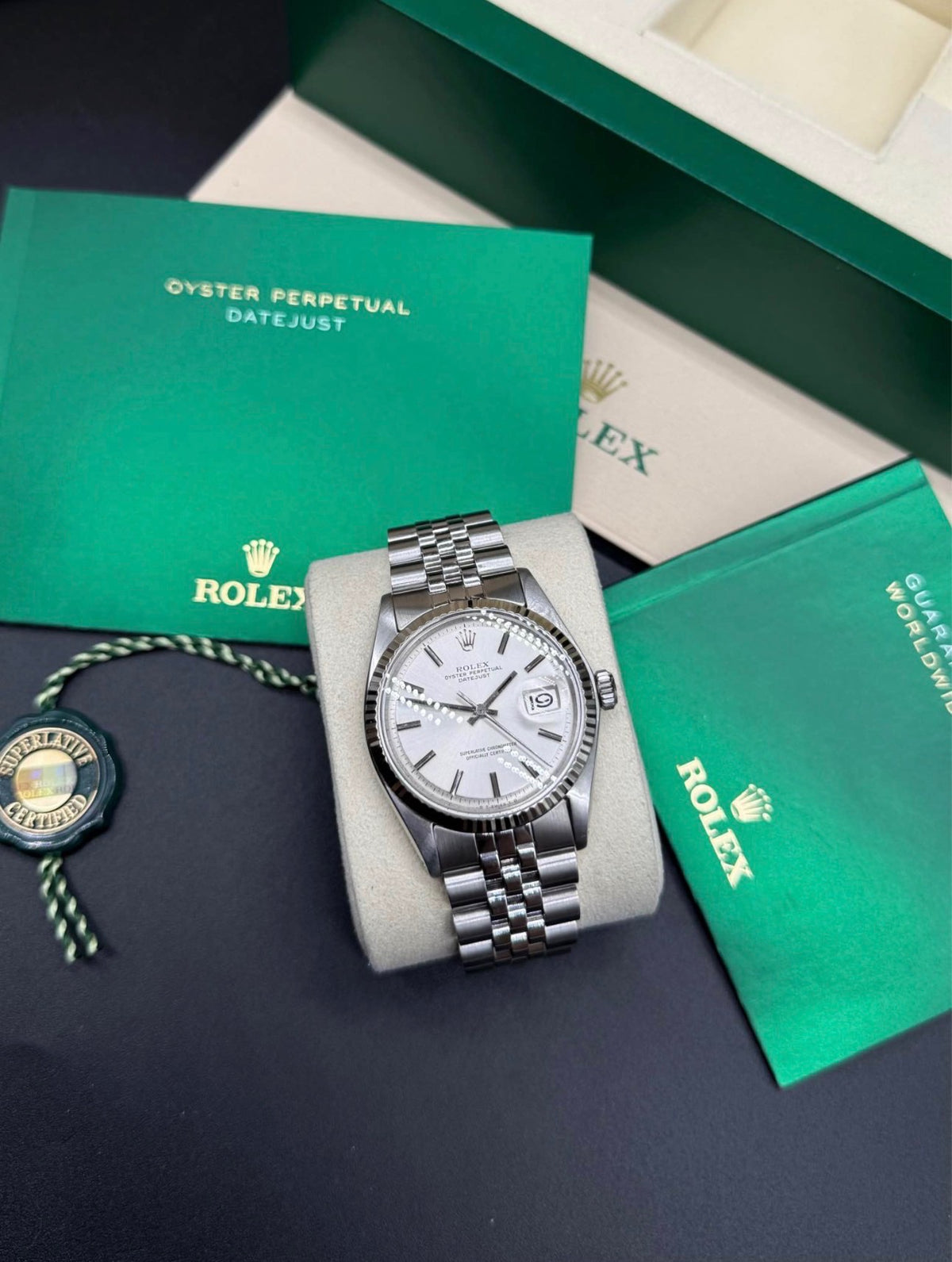 Rolex Datejust 16234 silver sunburst dial with Oyster Perpetual Datejust booklet, warranty booklet and hang tag