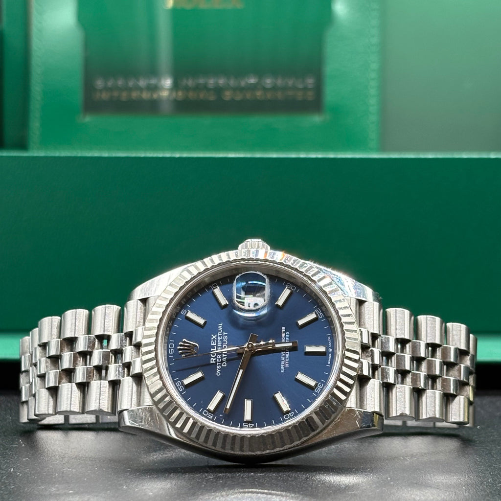 Rolex Datejust 41 blue fluted Jubilee angled close up of the winding crown and bracelet links