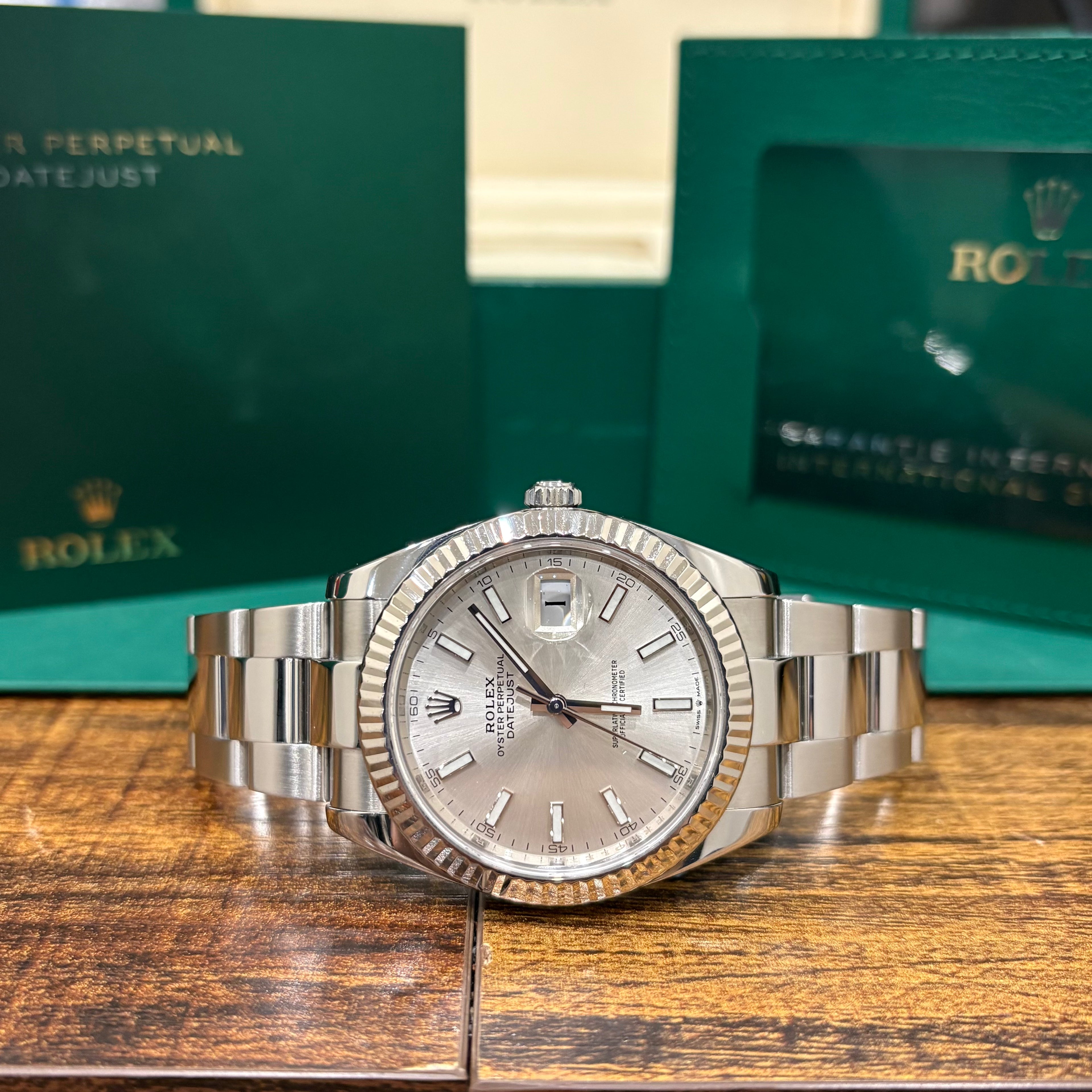 Rolex Datejust 41 ref 126334 Oystersteel silver stick dial with white gold fluted bezel on Oyster bracelet at Adonia Jewellers in Yorkville, Toronto