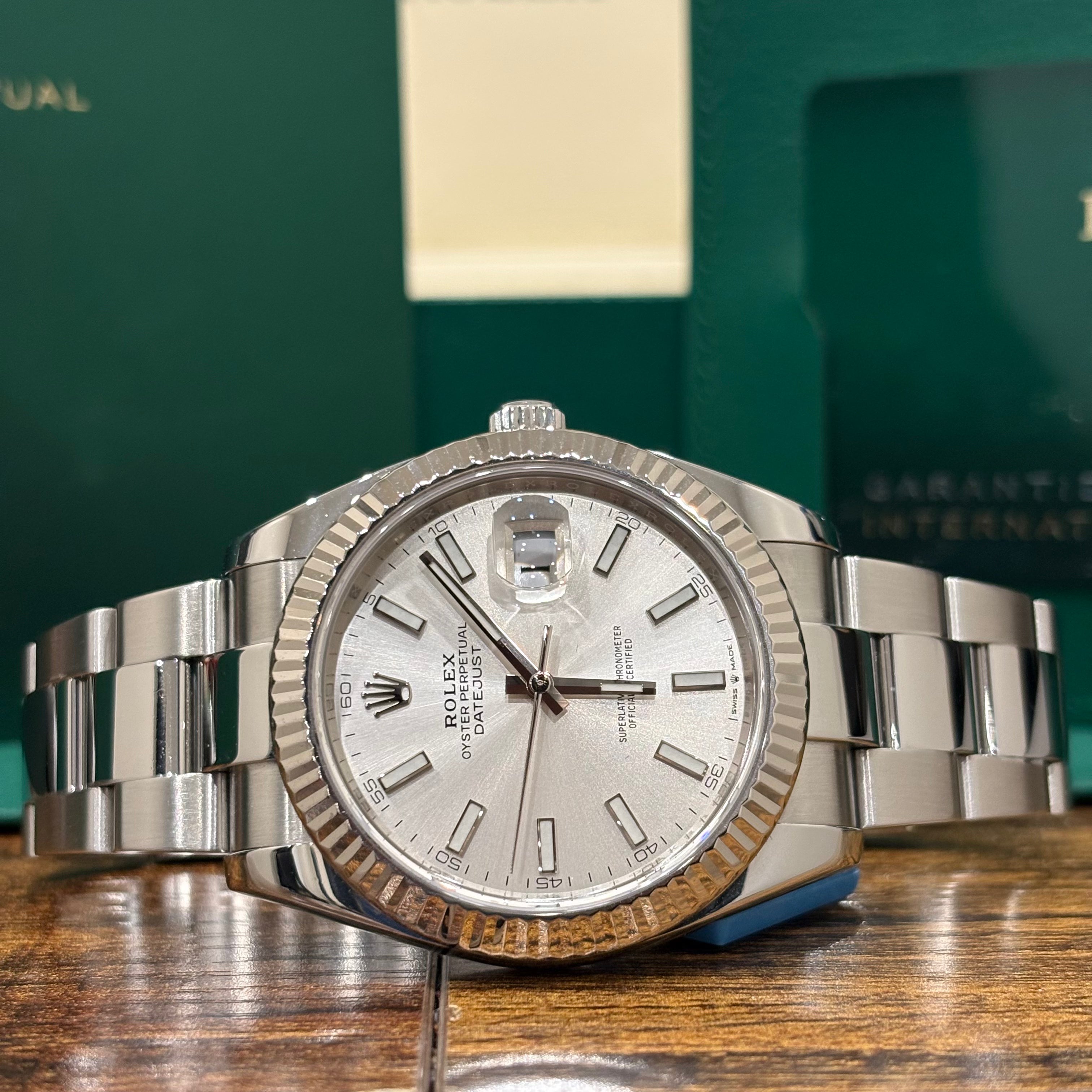 Rolex Datejust 41 126334 close view of the silver dial, stick markers and date Cyclops