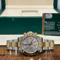 Rolex Cosmograph Daytona ref 116503 two tone silver dial on Oyster bracelet with its Rolex warranty card at Adonia Jewellers in Yorkville, Toronto