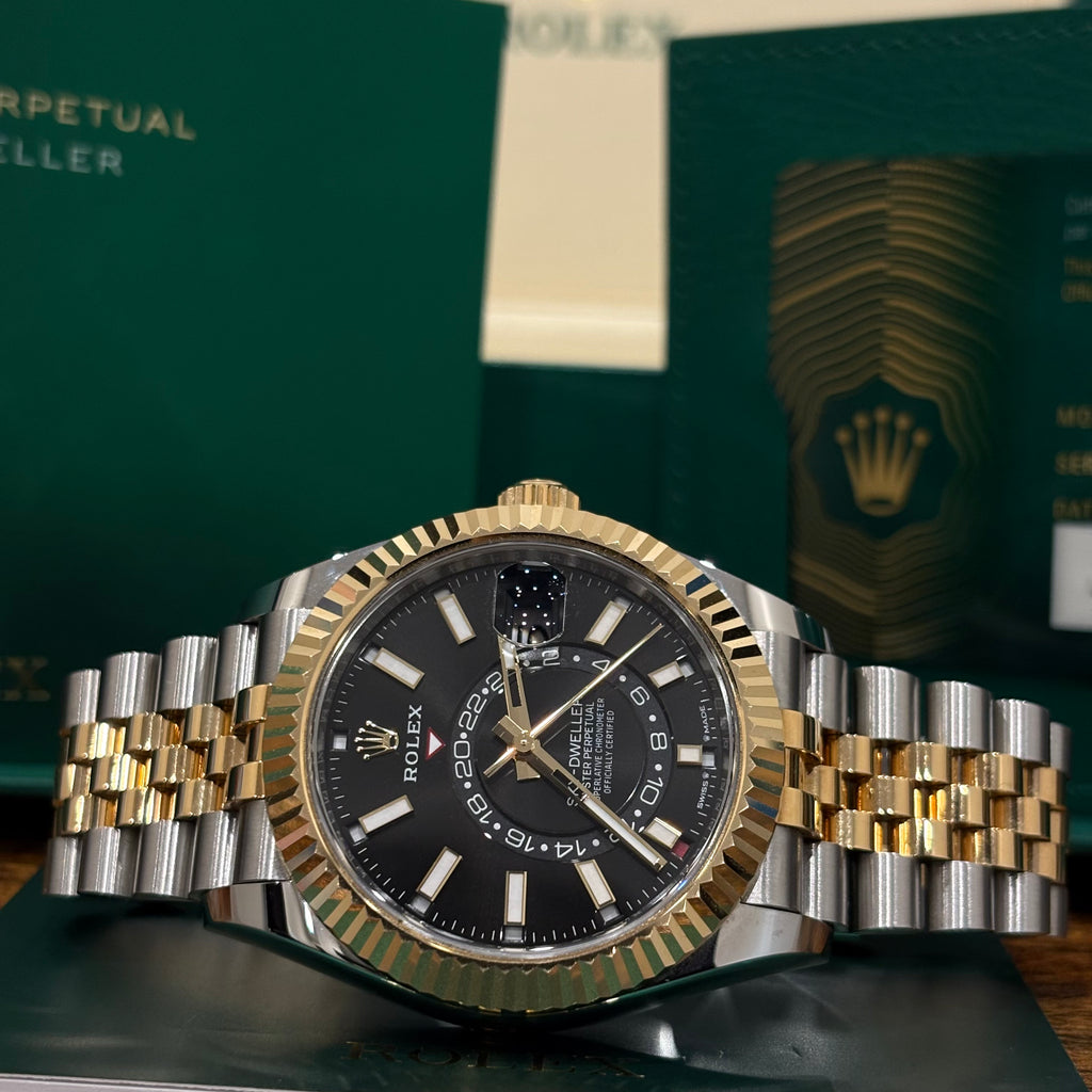 Rolex Sky Dweller 42mm black dial side on view of the two tone Oystersteel and yellow gold Jubilee bracelet