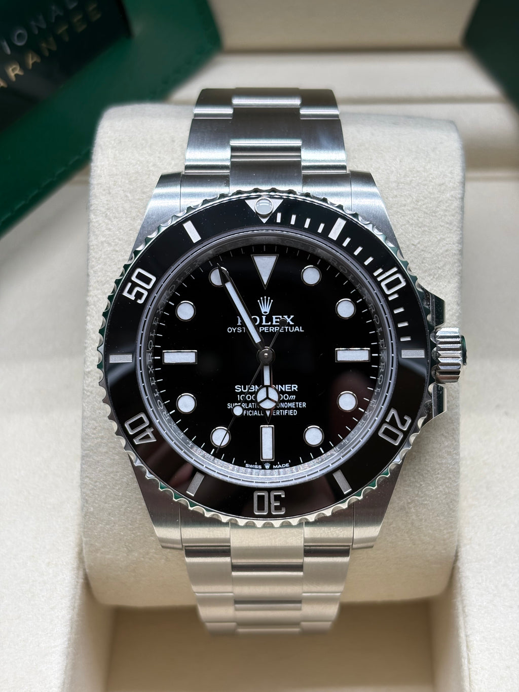 Rolex Submariner 41 front view of the black dial with luminous hour markers and graduated ceramic dive bezel