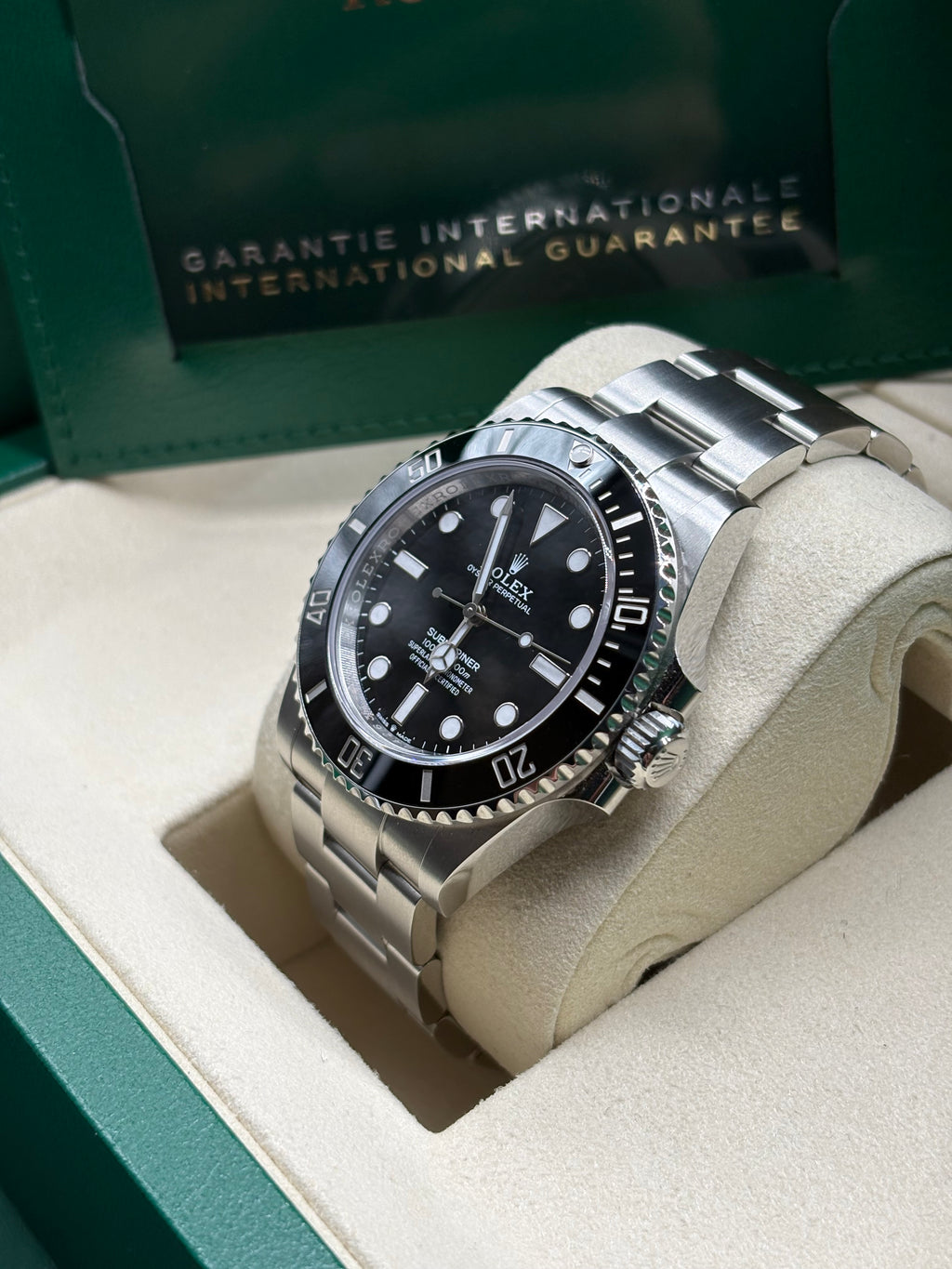 Rolex Submariner 41mm side view showing the Triplock crown and crown guards