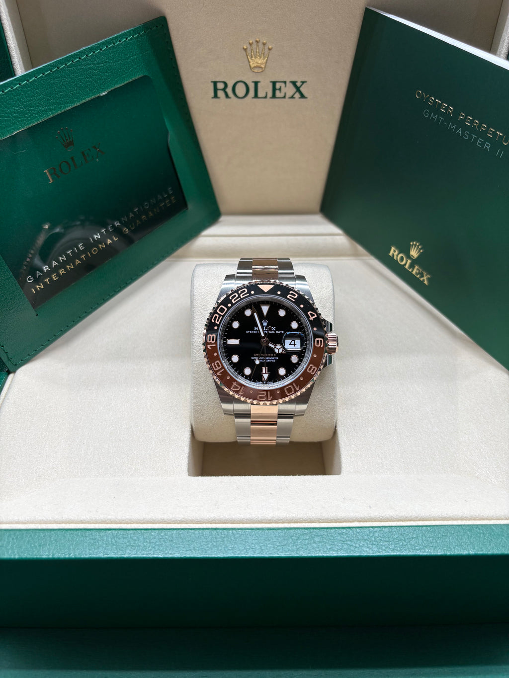Rolex GMT Master II Root Beer 2026 full set in its green Rolex box with International Guarantee wallet and booklet