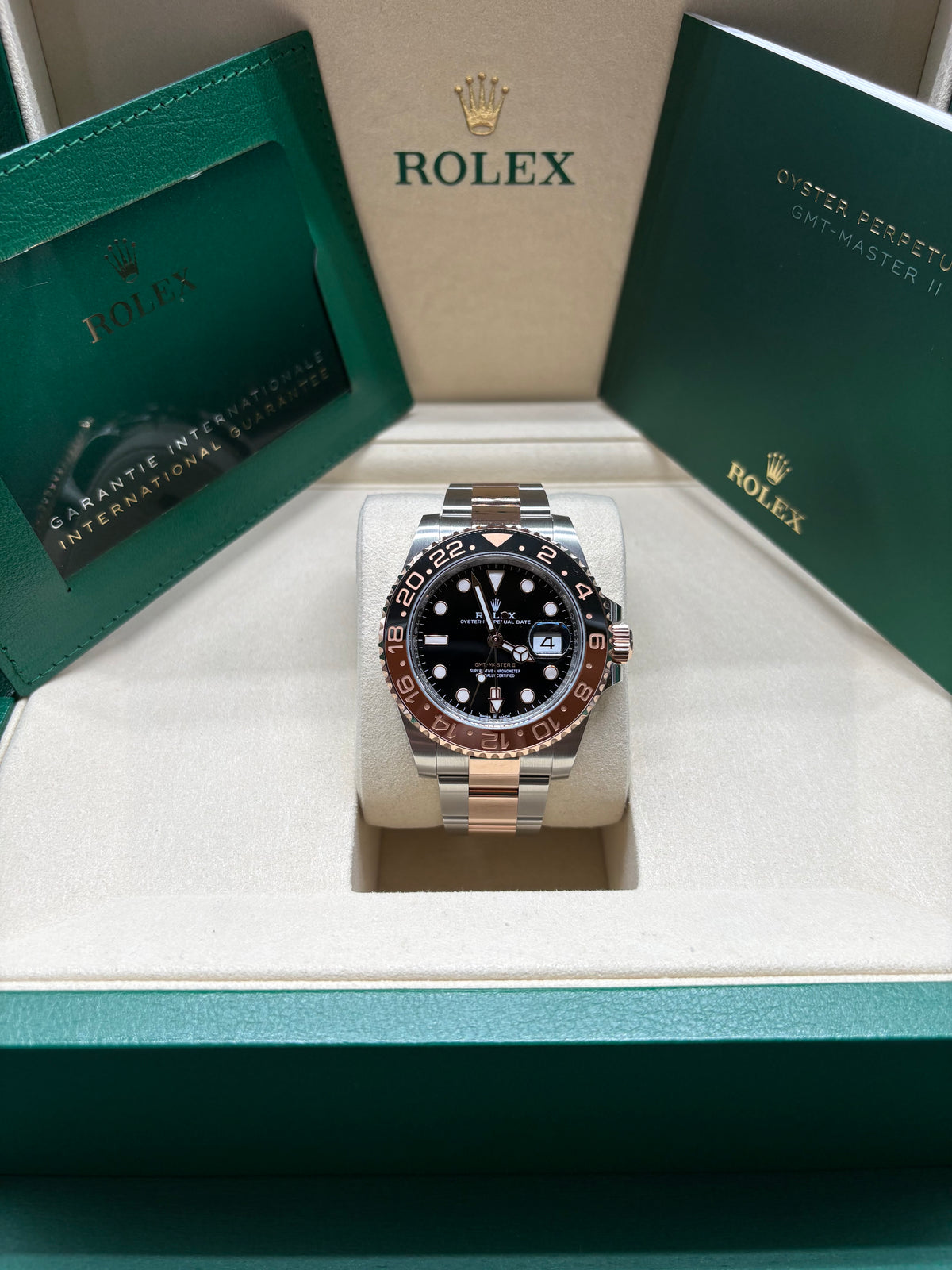 Rolex GMT Master II Root Beer 2026 full set in its green Rolex box with International Guarantee wallet and booklet
