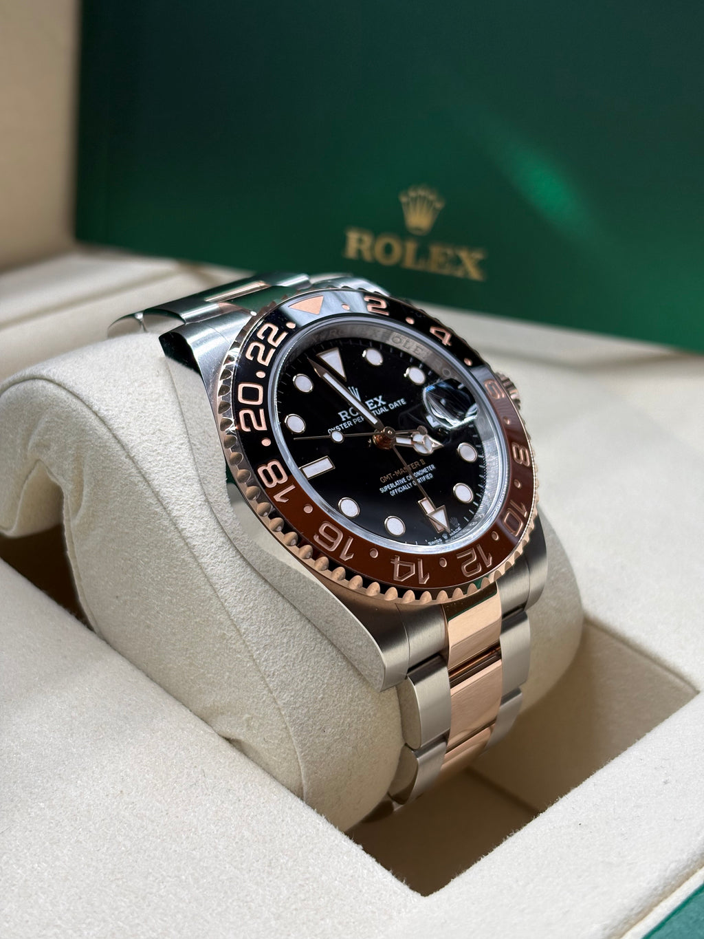 Rolex GMT Master II Root Beer left side profile of the two tone Everose Rolesor case and ceramic bezel