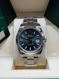 Rolex Datejust 41mm ref 126334 mint green dial with white gold fluted bezel on Oyster bracelet at Adonia Jewellers in Yorkville, Toronto