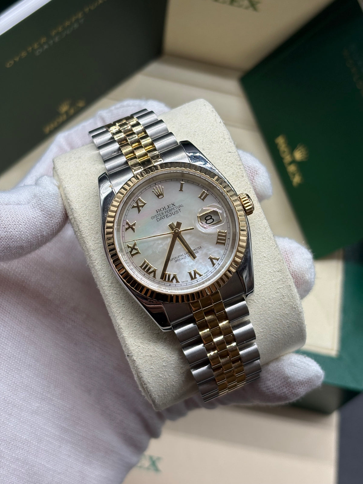 Rolex Datejust 36mm ref 116233 two tone white mother of pearl Roman dial on Jubilee bracelet at Adonia Jewellers in Yorkville, Toronto