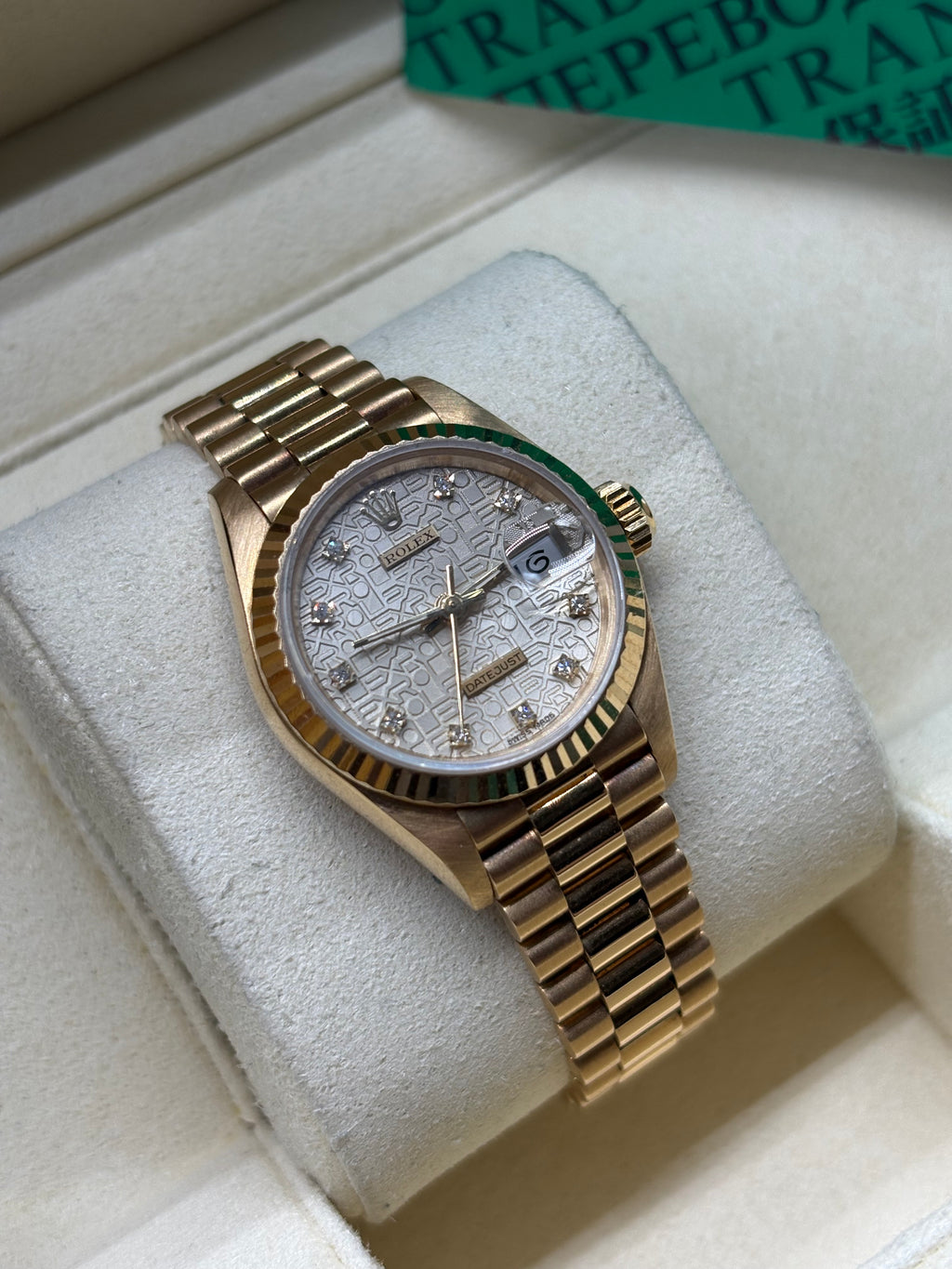 Rolex Lady Datejust 26 silver Jubilee Computer dial with factory diamond hour markers, angled view on its cushion