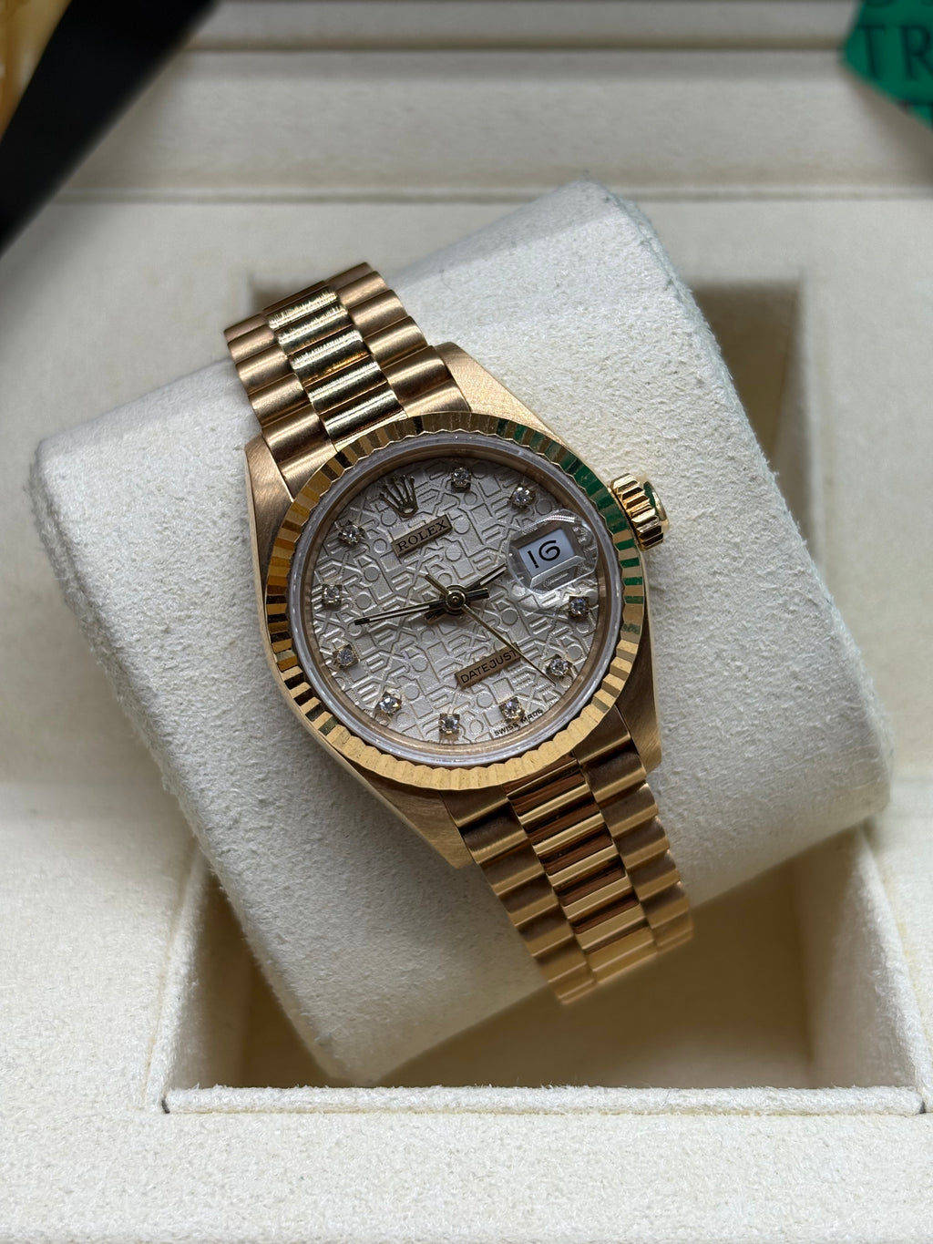 Rolex Lady Datejust 26mm silver diamond dial front view in its Rolex box