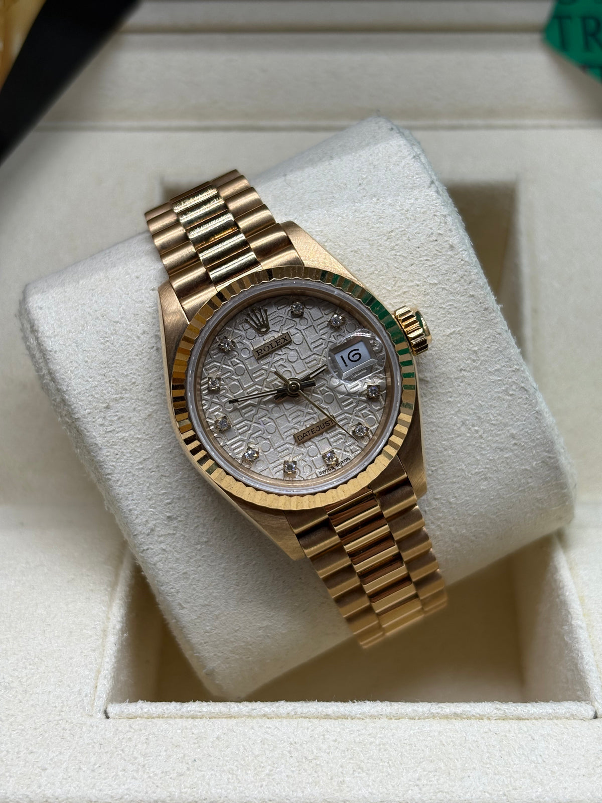 Rolex Lady Datejust 26mm silver diamond dial front view in its Rolex box