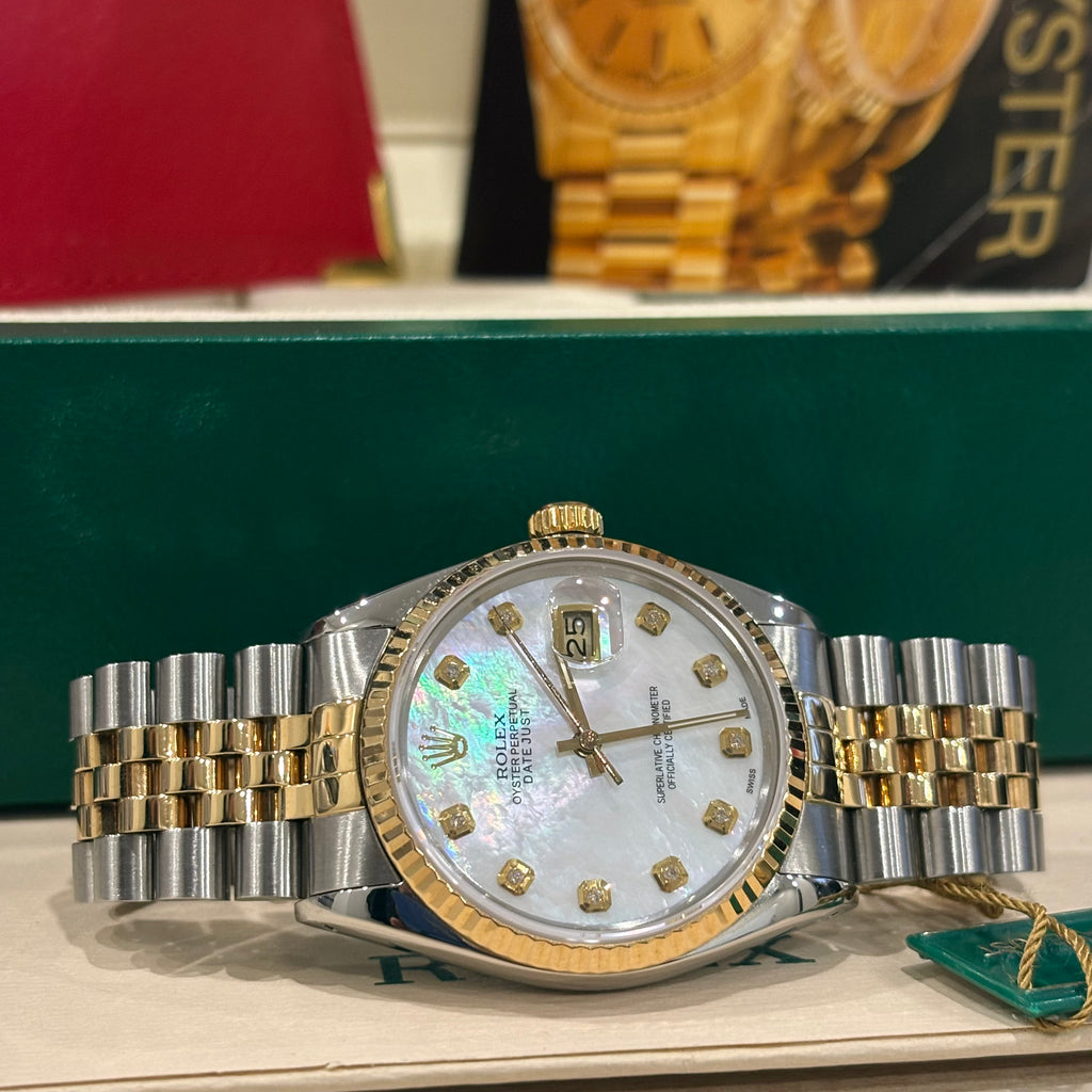 Rolex Datejust 36 mother of pearl diamond dial wide view with green Rolex hang tag
