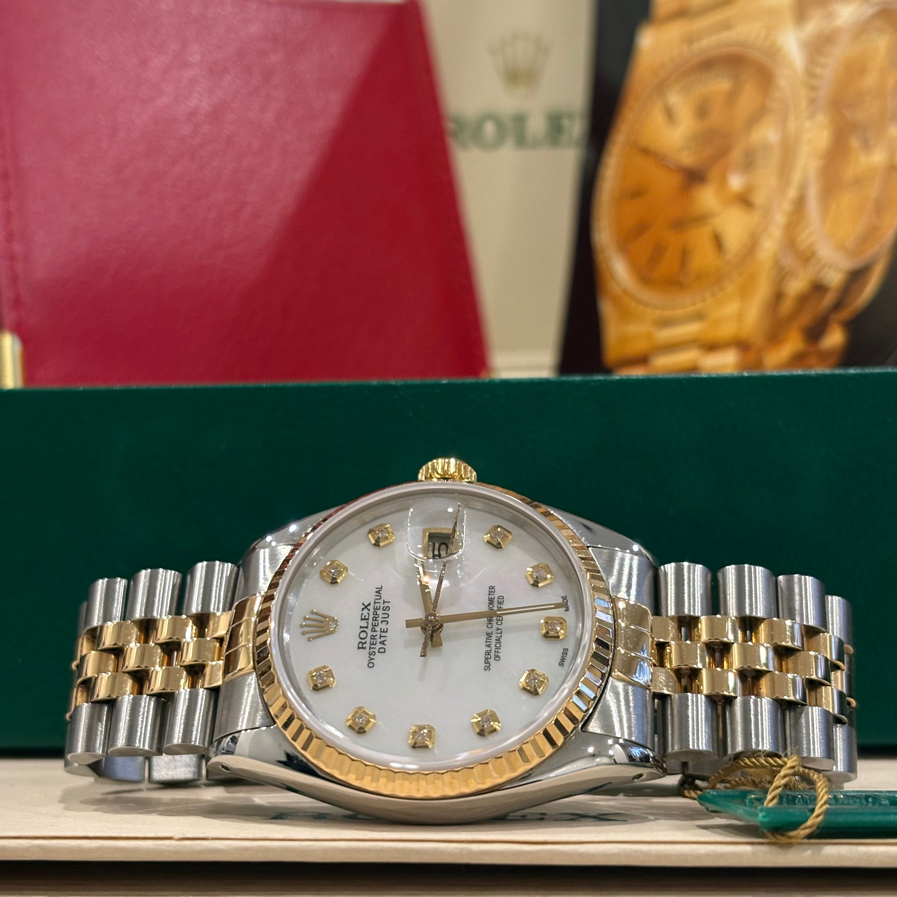 Rolex Datejust 16013 iridescent mother of pearl dial with gold set diamond markers, side on view