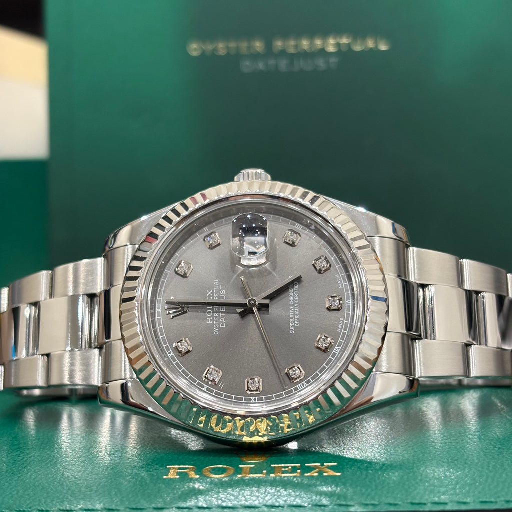 Rolex Datejust 41 126334 slate dial angled close up of the fluted bezel and winding crown