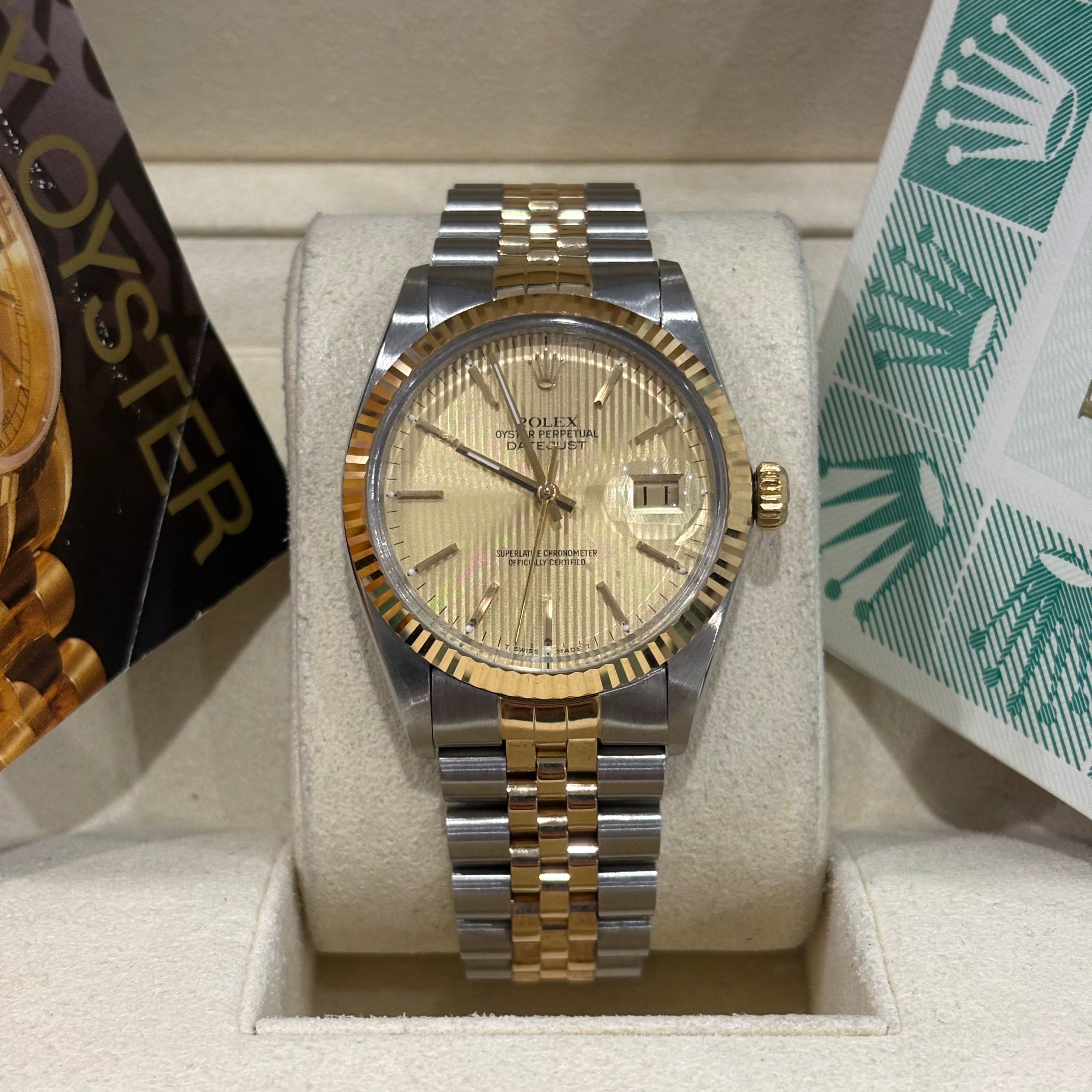 Rolex Datejust 36 two tone champagne tapestry dial on Jubilee bracelet in its Rolex box at Adonia Jewellers in Yorkville, Toronto