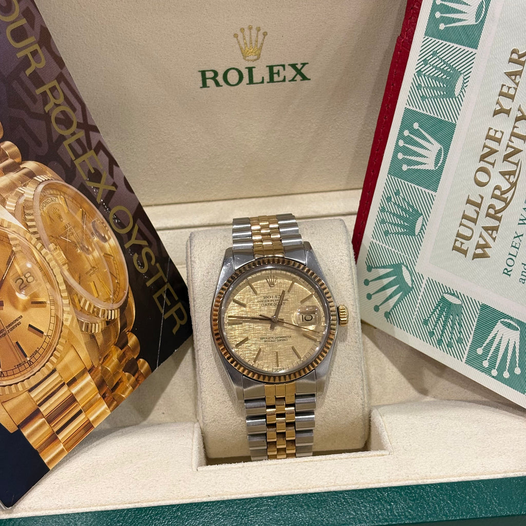 Rolex Datejust 36 champagne linen dial wide view with full one year warranty booklet