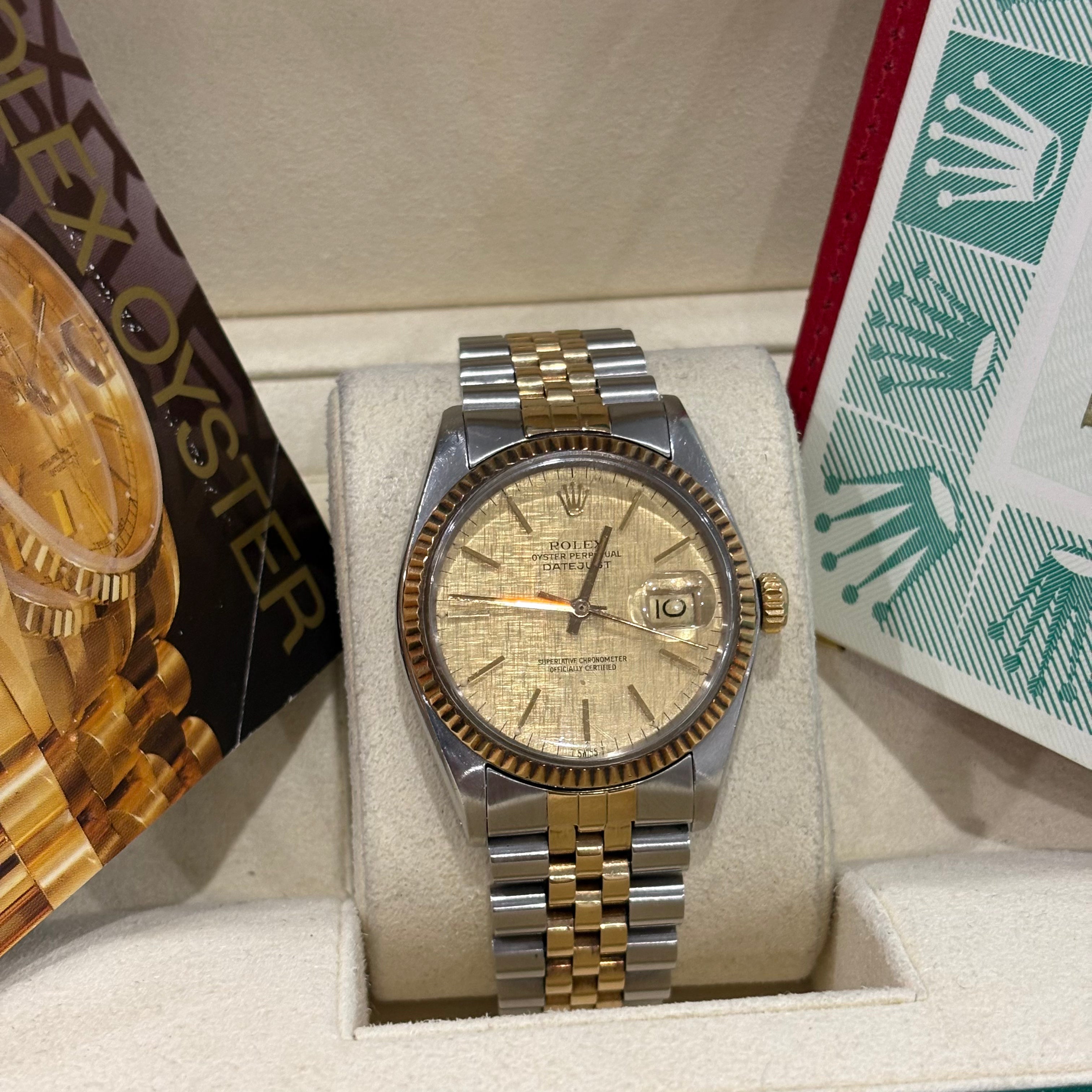 Rolex Datejust 36 two tone linen dial front view on its cushion