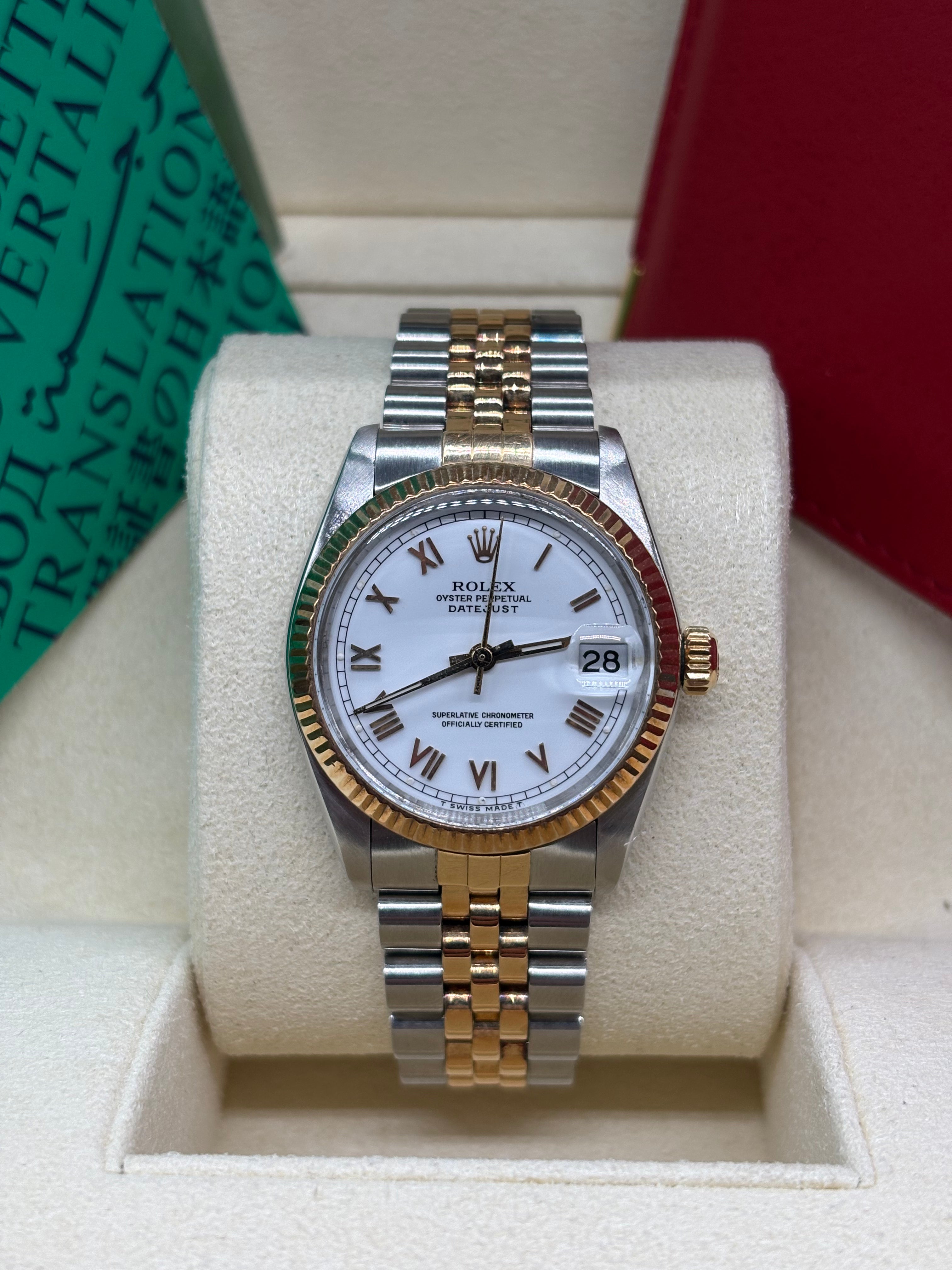 Rolex Datejust 31 White Roman Dial Oystersteel and 18K Yellow Gold - Ref. 6827