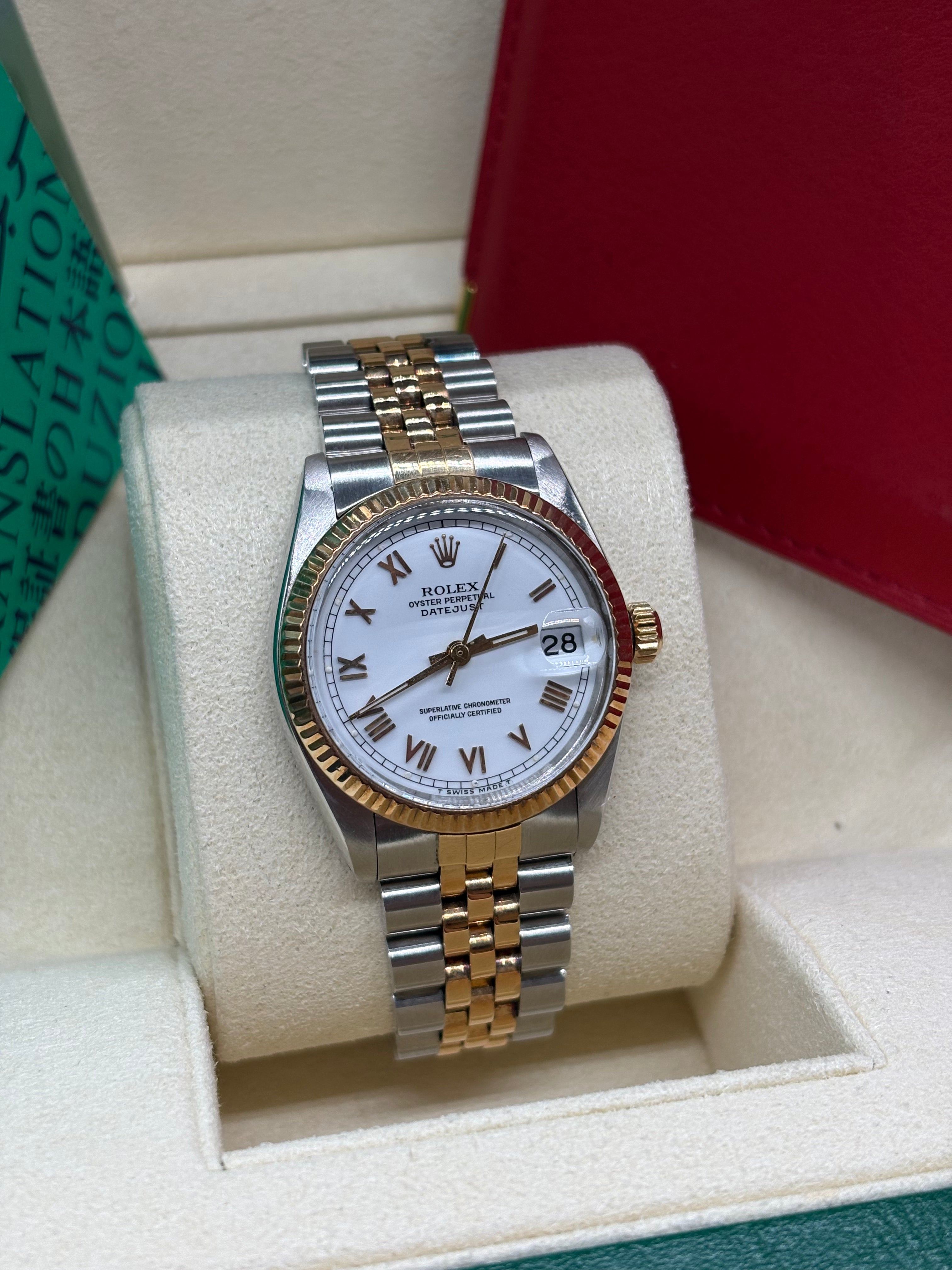 Rolex Datejust 31 White Roman Dial Oystersteel and 18K Yellow Gold - Ref. 6827