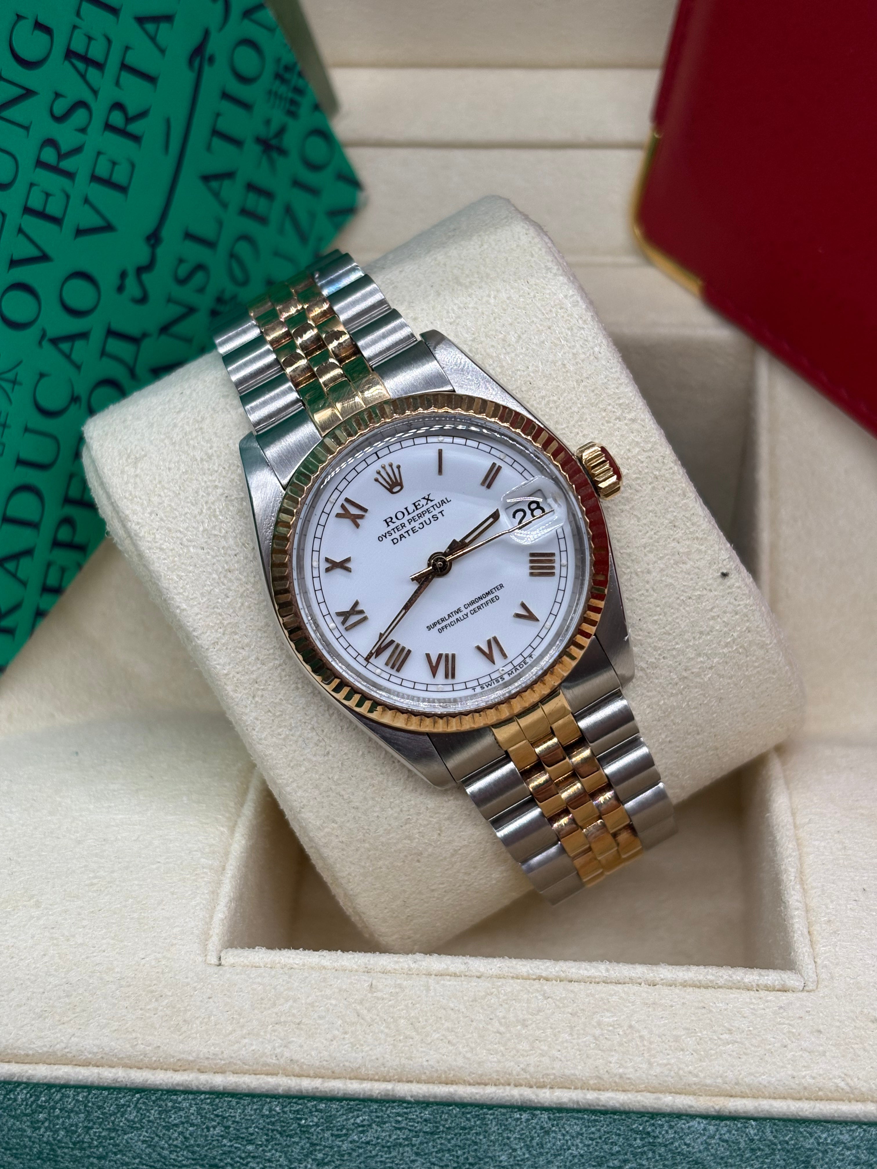Rolex Datejust 31 White Roman Dial Oystersteel and 18K Yellow Gold - Ref. 6827