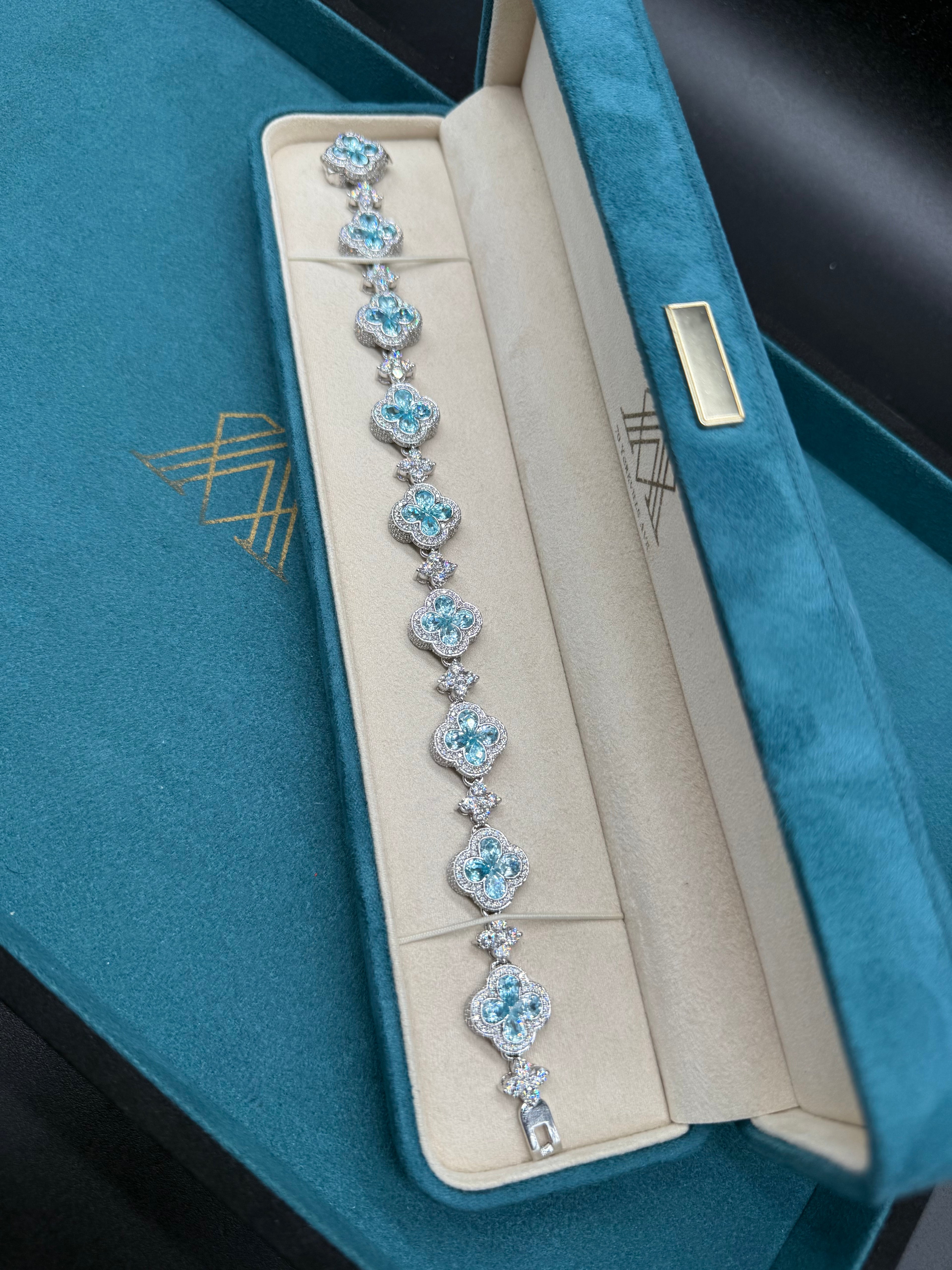 10K White Gold Blue Topaz and Diamond Clover Station Bracelet