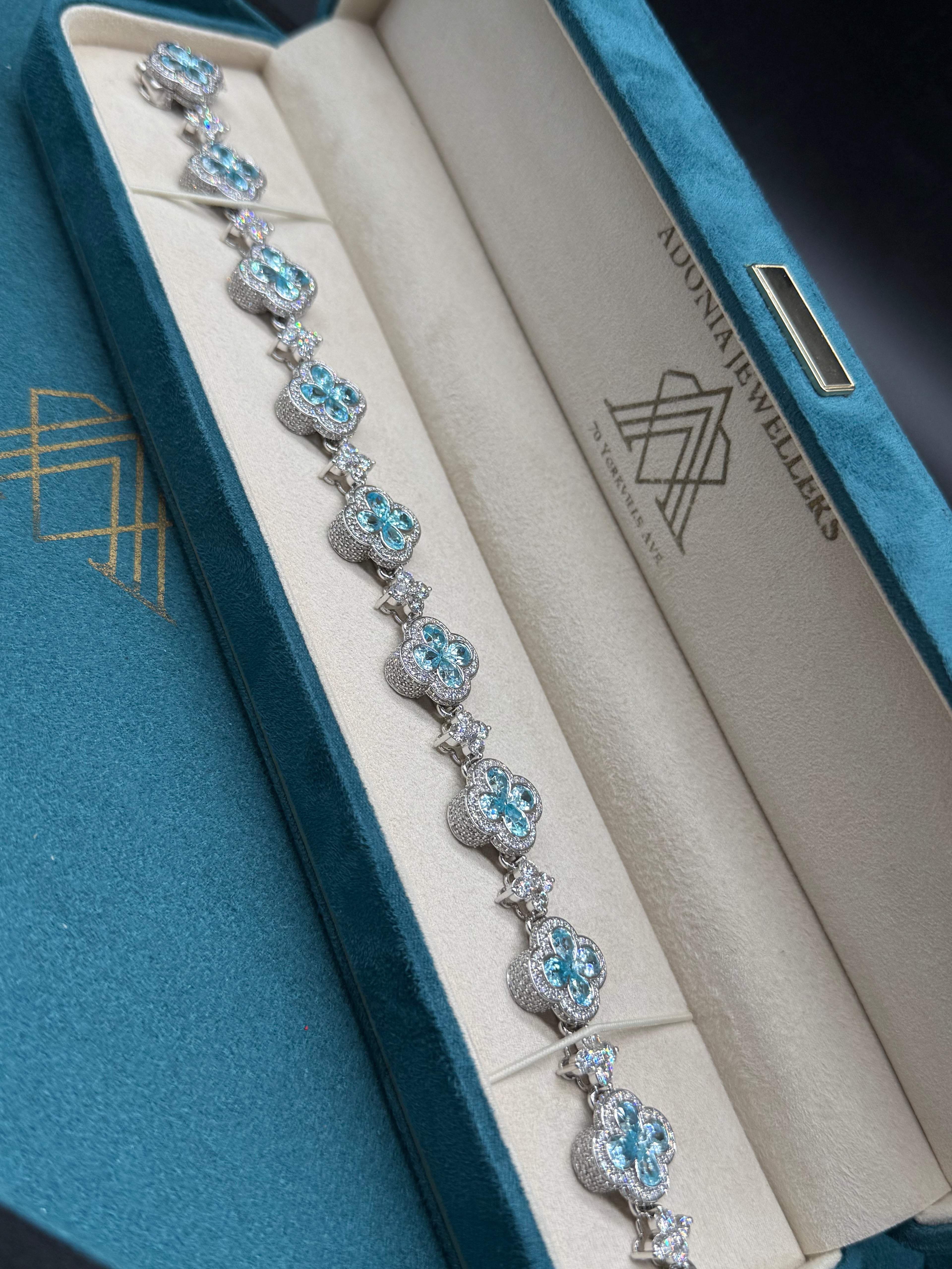 10K White Gold Blue Topaz and Diamond Clover Station Bracelet