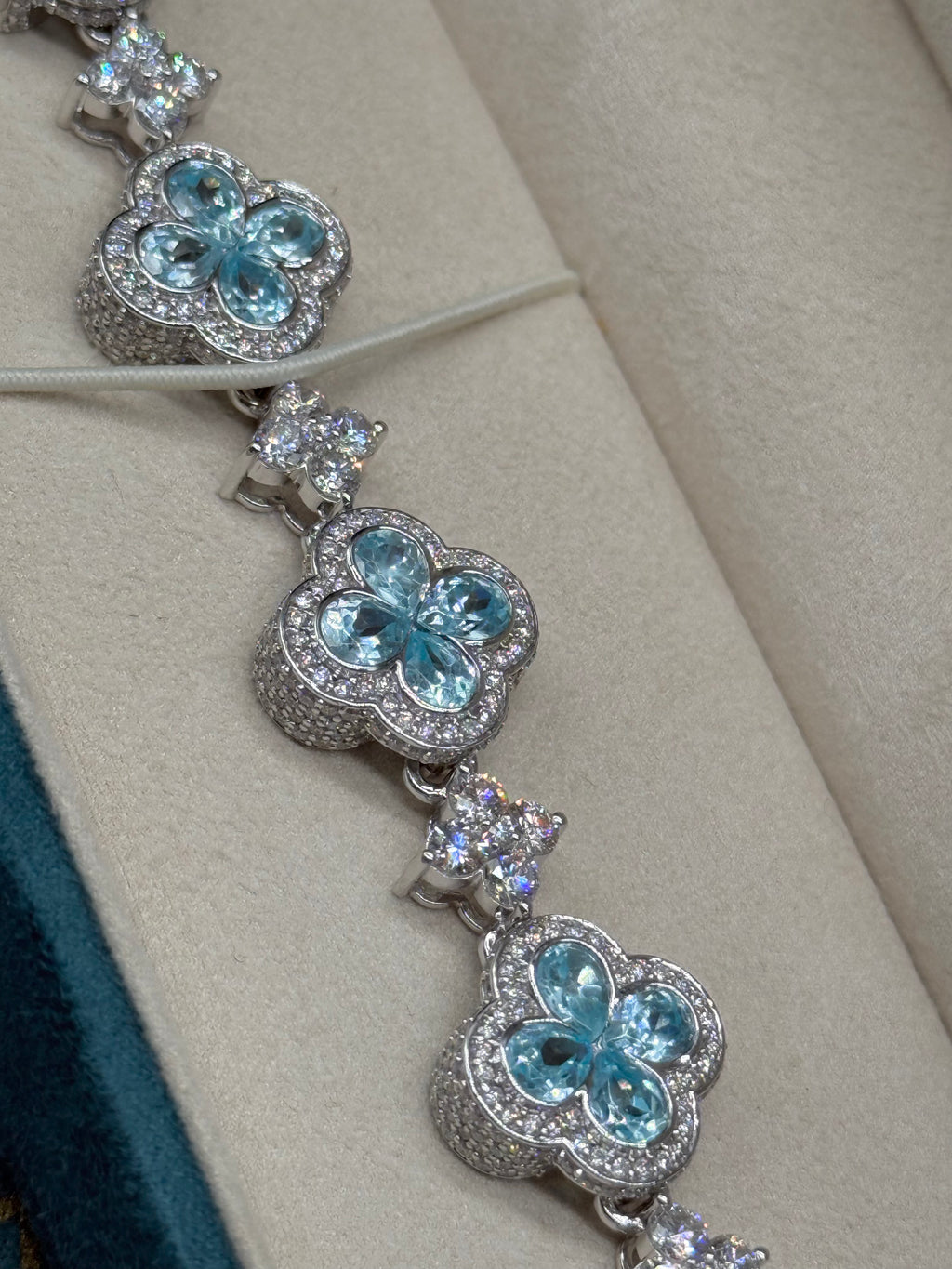 10K White Gold Blue Topaz and Diamond Clover Station Bracelet