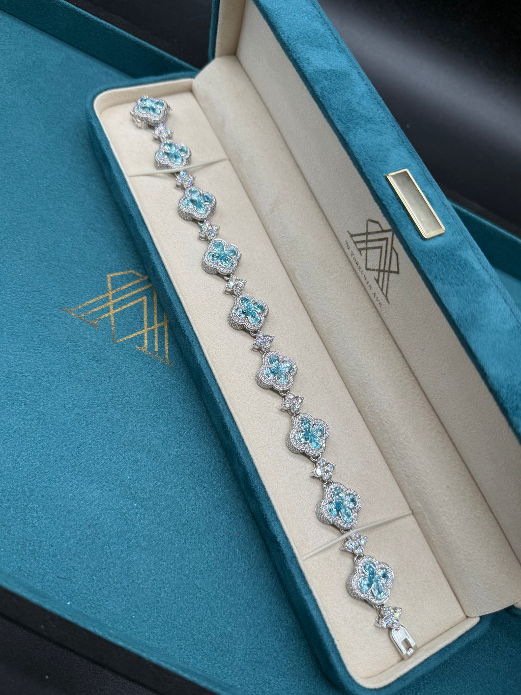 10K White Gold Blue Topaz and Diamond Clover Station Bracelet