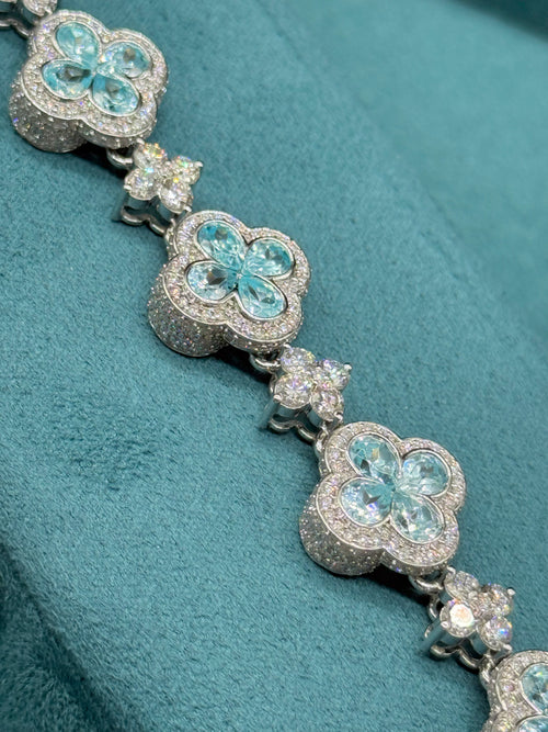 10K White Gold Blue Topaz and Diamond Clover Station Bracelet