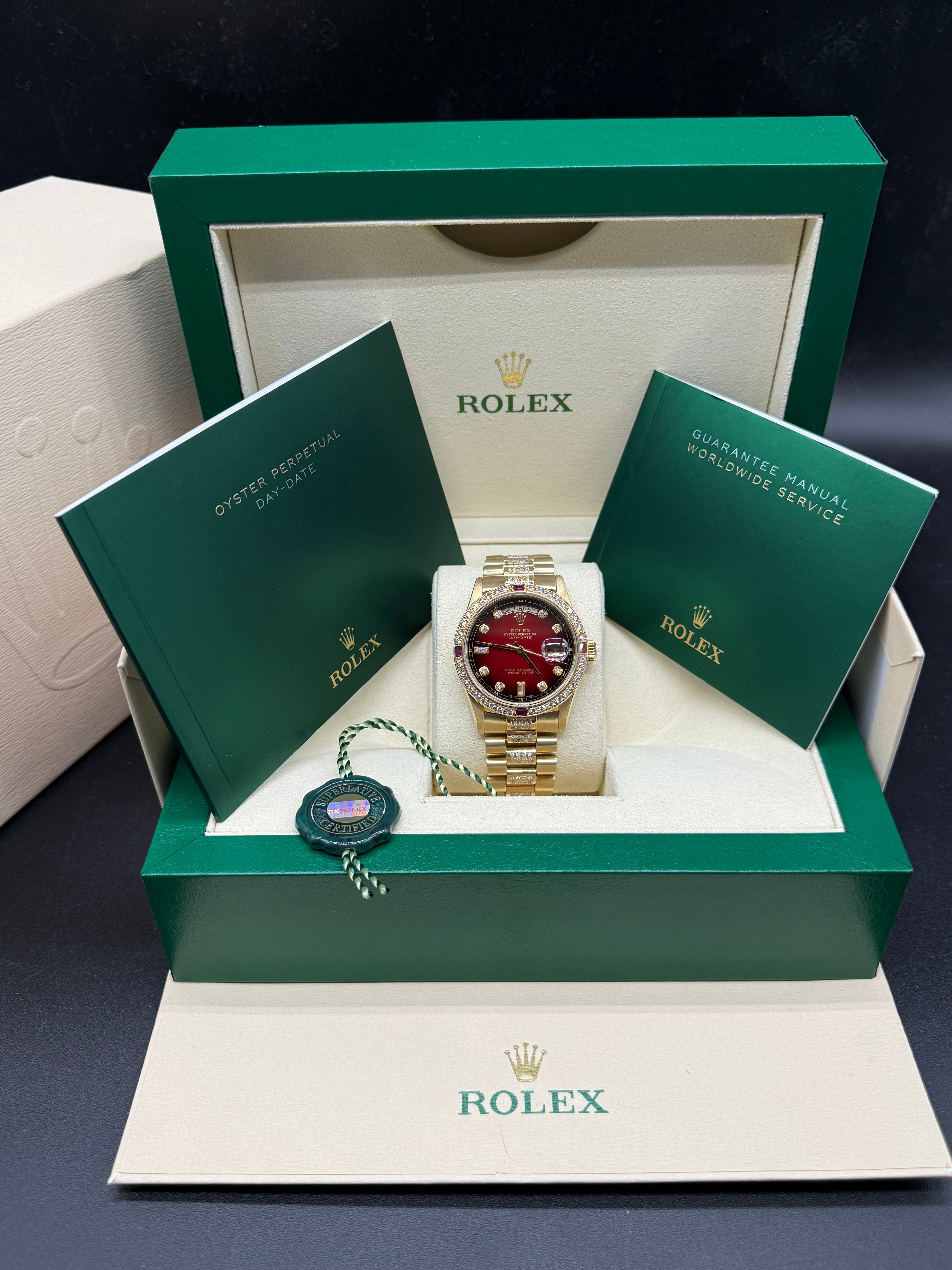 Rolex Day-Date 36mm 18K Yellow Gold Red Vignette Dial Diamond & Ruby Bezel Diamond President Bracelet
