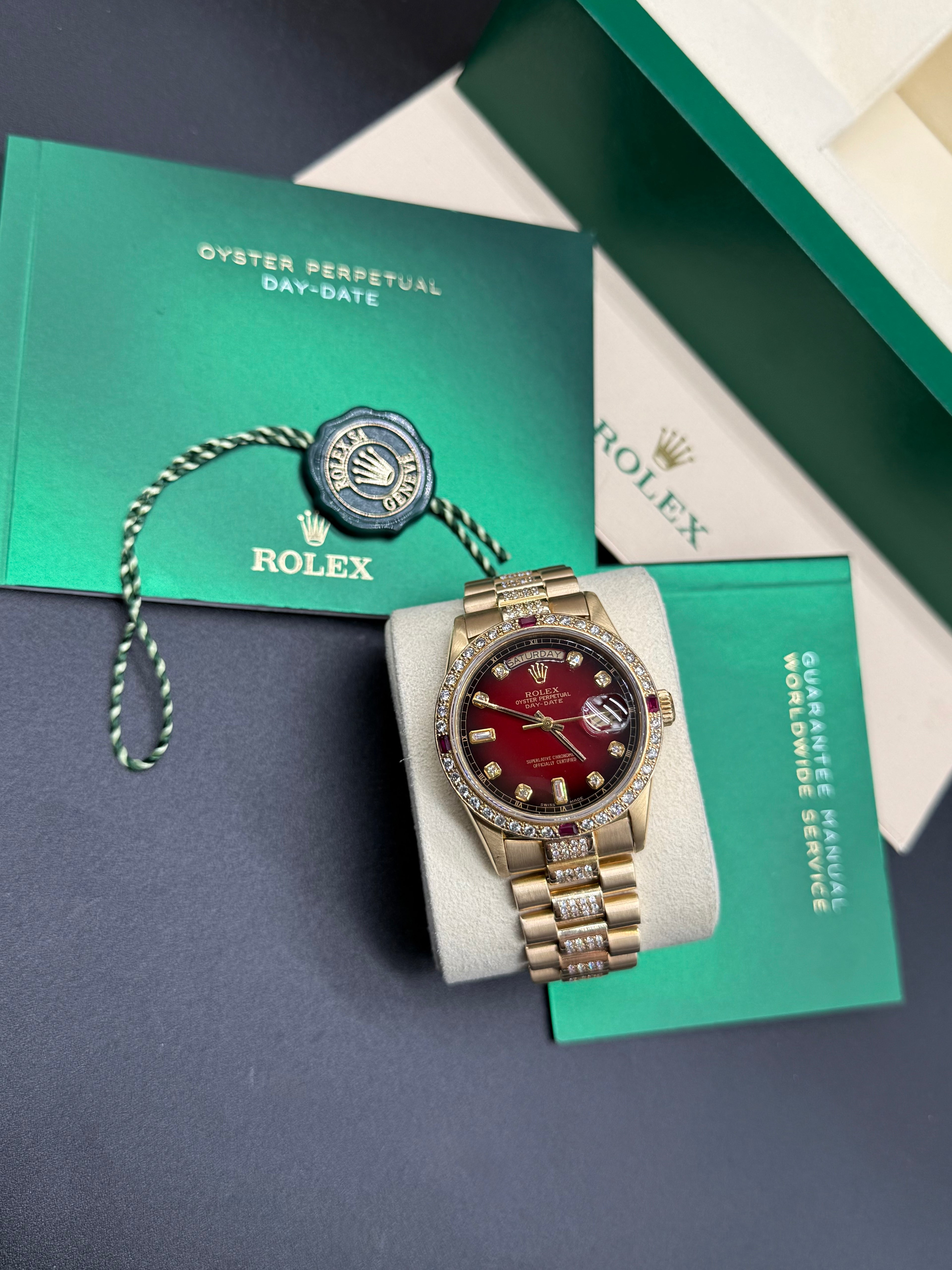 Rolex Day-Date 36mm 18K Yellow Gold Red Vignette Dial Diamond & Ruby Bezel Diamond President Bracelet