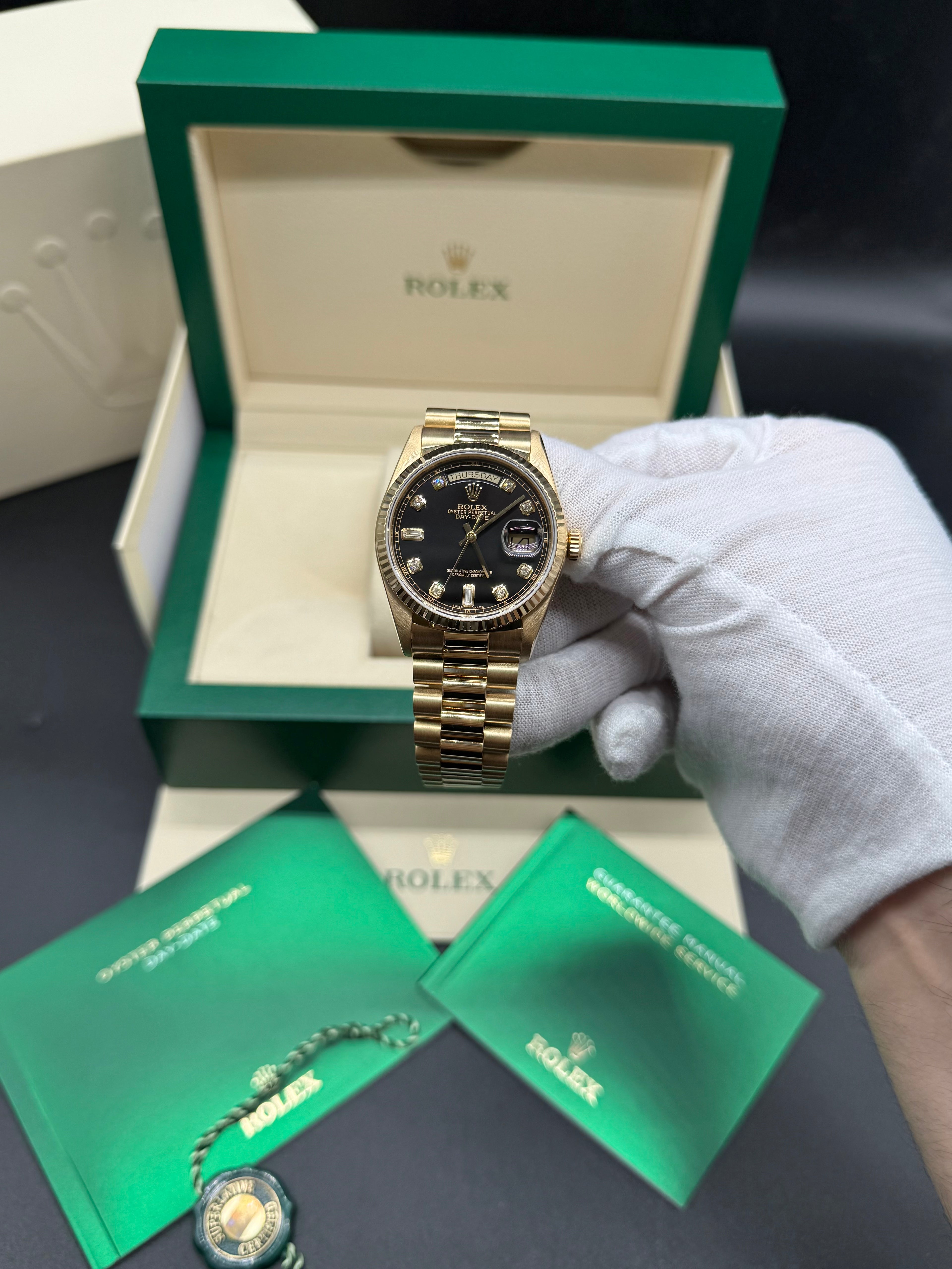 Rolex Day-Date 36mm 18K Yellow Gold Factory Black Baguette Diamond Dial Fluted Bezel President Bracelet