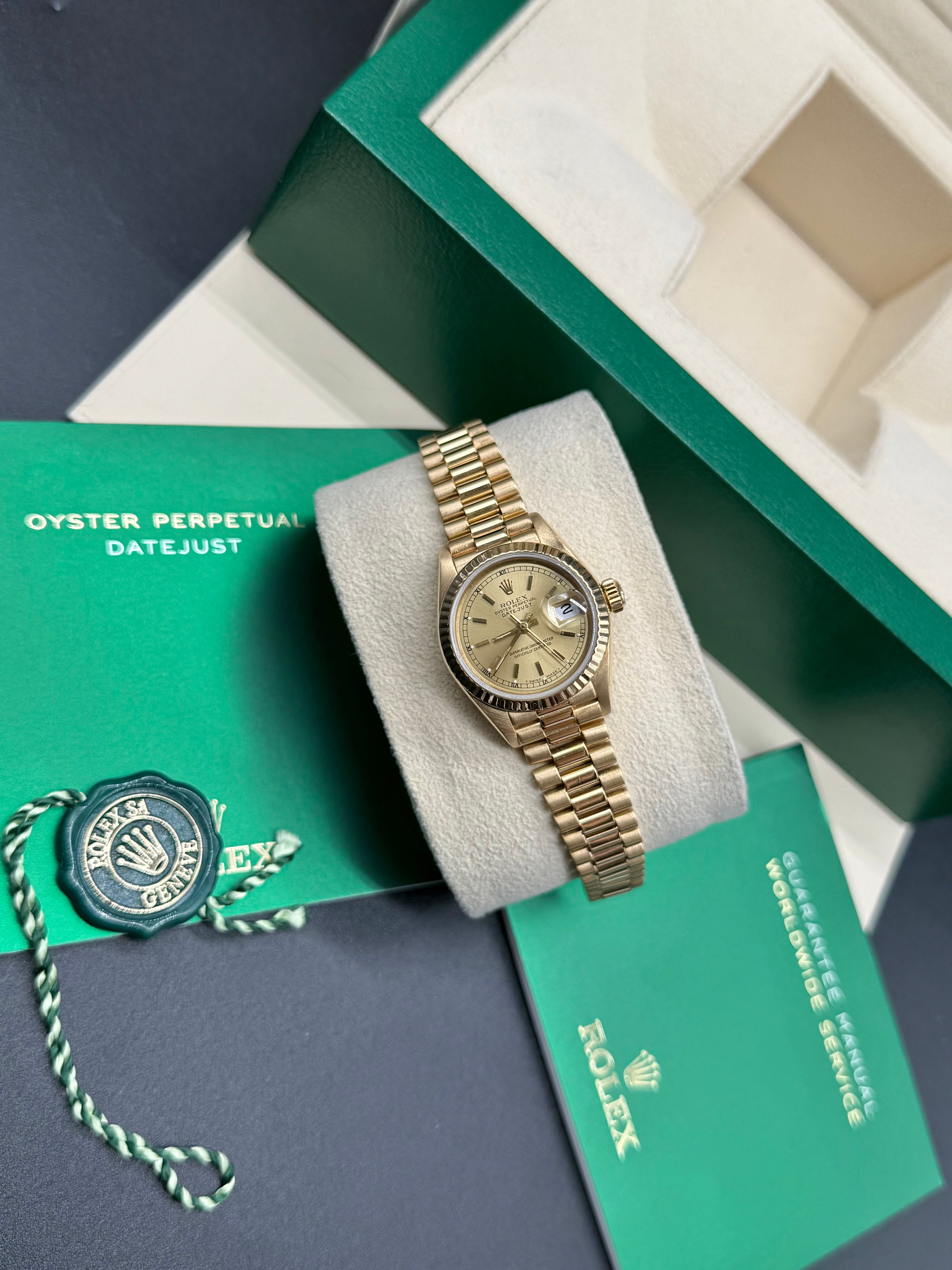 Rolex Lady-Datejust 26mm 18K Yellow Gold Champagne Stick Dial President