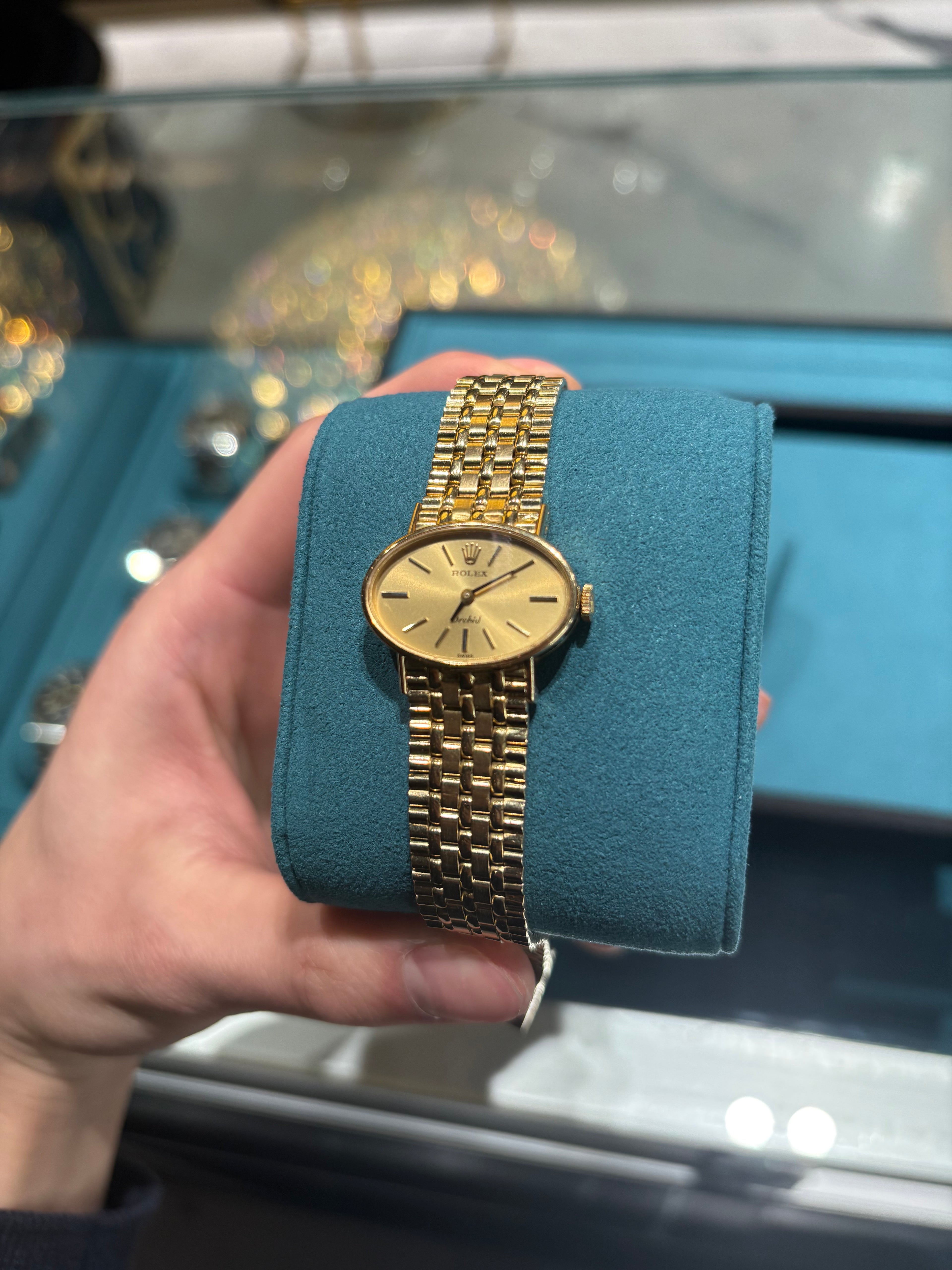 Rolex Orchid Ladies 18k Yellow Gold Champagne Dial Gold Bracelet