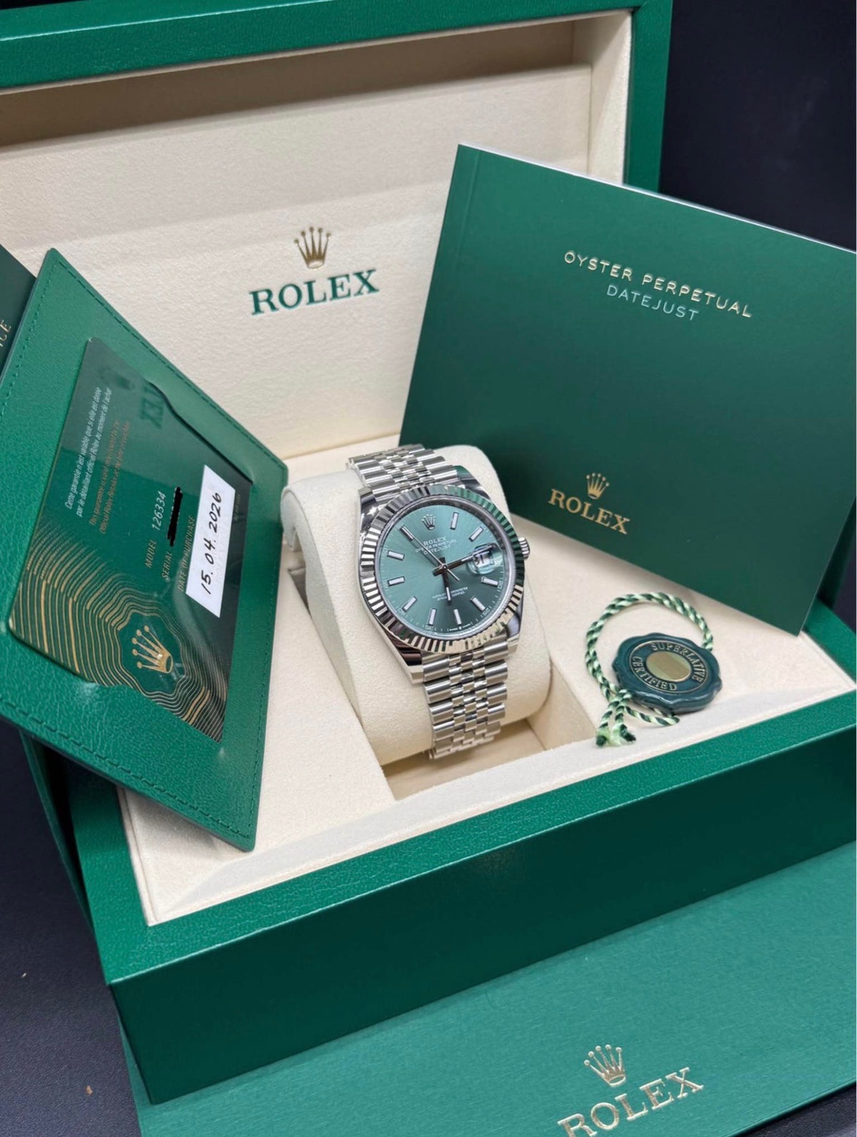 Rolex Datejust 41 mint green 2026 full set in its green Rolex box with warranty card, Datejust booklet and hang tag