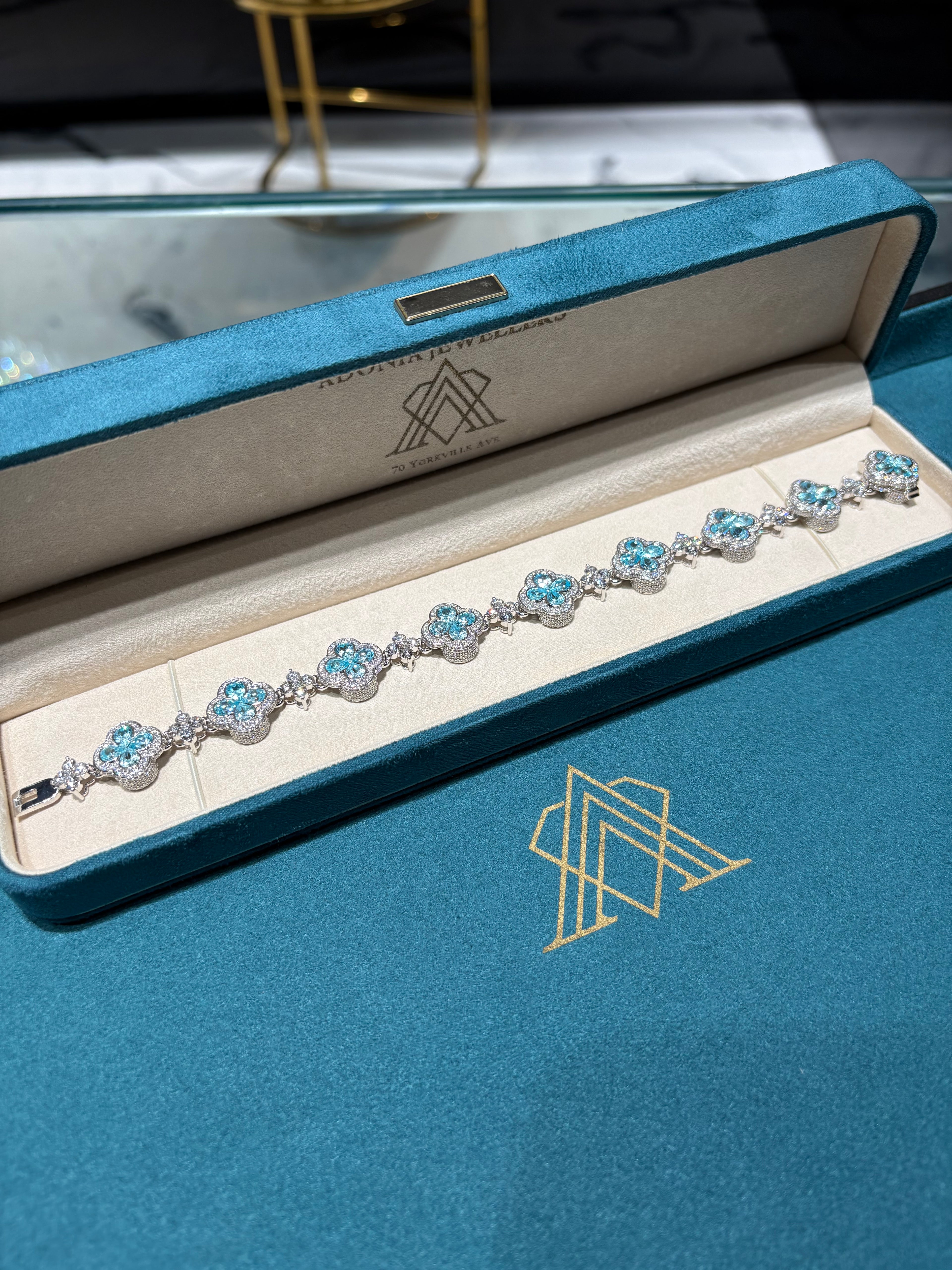 10K White Gold Blue Topaz and Diamond Clover Station Bracelet