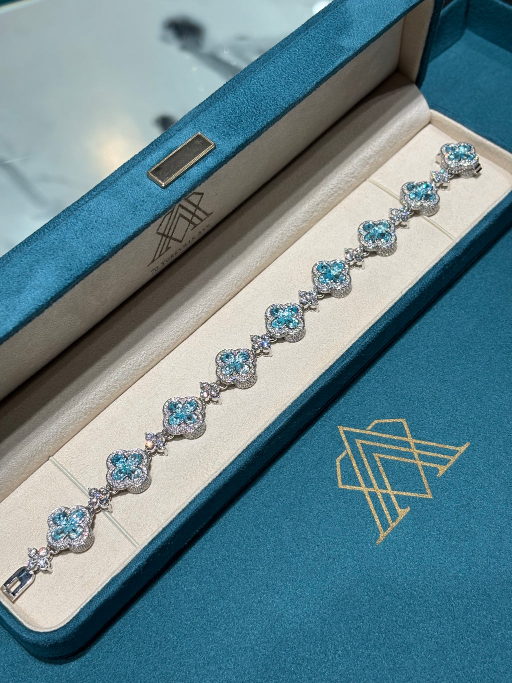 10K White Gold Blue Topaz and Diamond Clover Station Bracelet