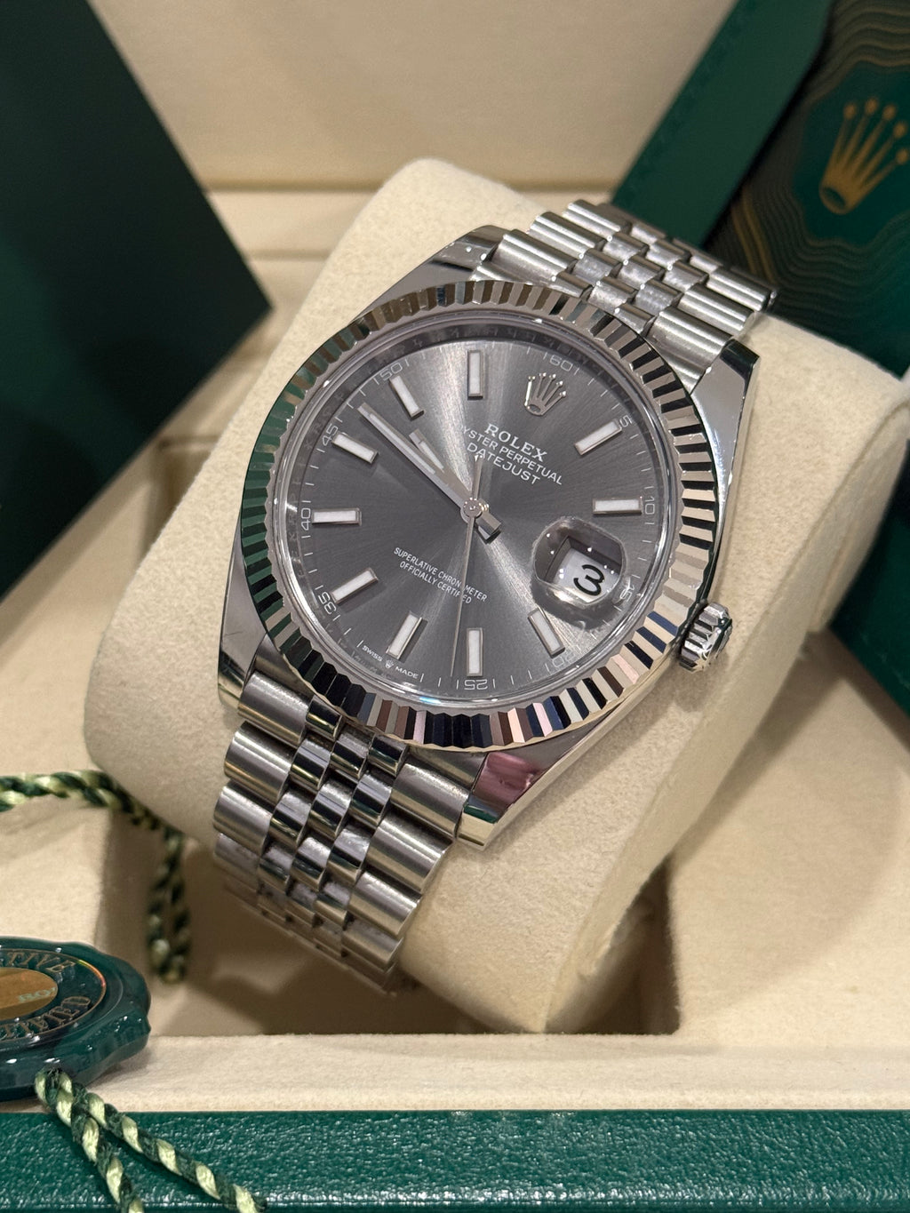 Rolex Datejust 41mm slate dial angled view of the stick markers, date Cyclops and fluted bezel